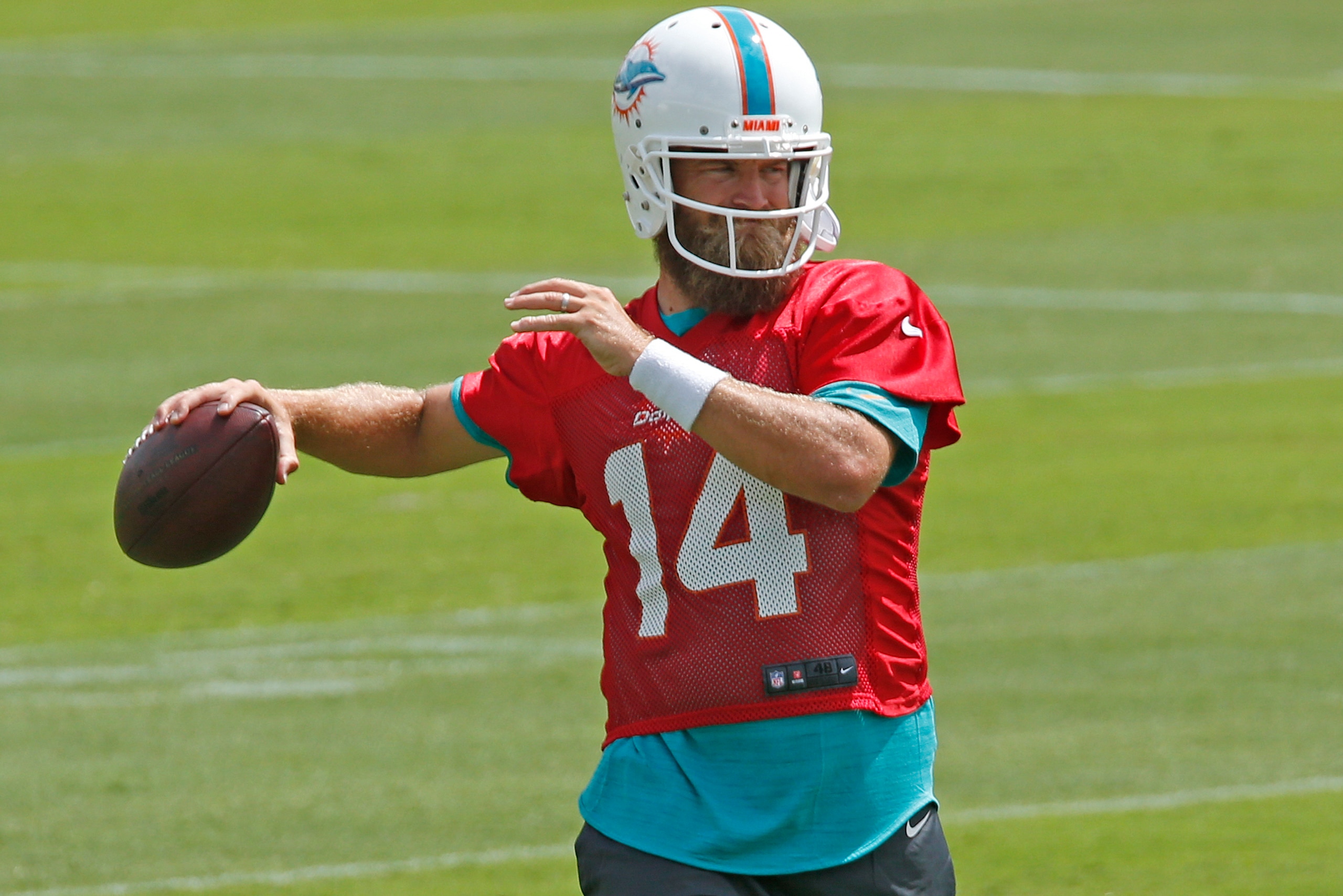DAVIE, FL - APRIL 17: Ryan Fitzpatrick #14 of the Miami Dolphins throws the ball during the team's voluntary minicamp on April 17, 2019 at the Miami Dolphins training facility in Davie, Florida. (Photo by Joel Auerbach/Getty Images)