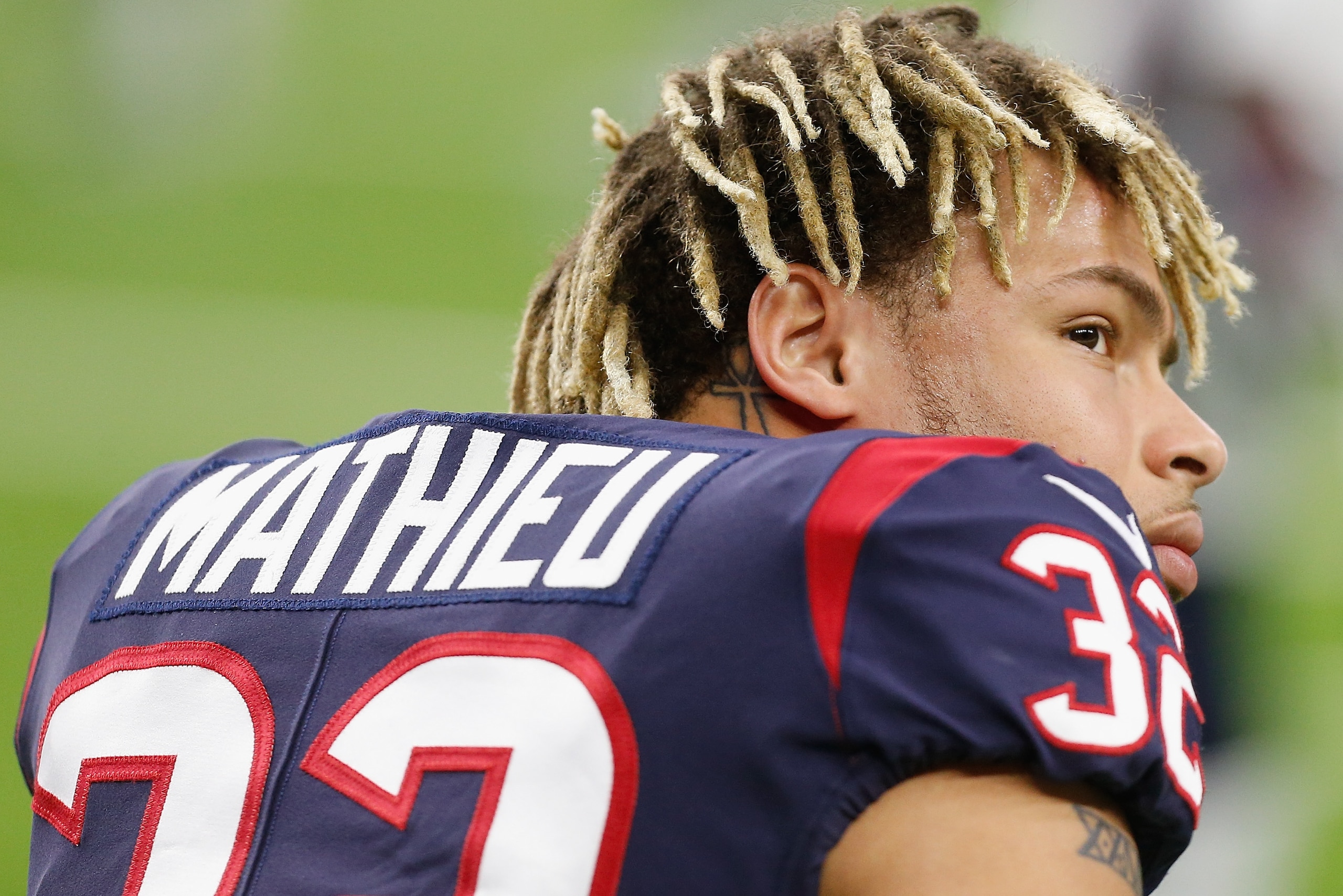 HOUSTON, TEXAS - DECEMBER 30: Tyrann Mathieu #32 of the Houston Texans takes a moment during warm-up before playing the Jacksonville Jaguars at NRG Stadium on December 30, 2018 in Houston, Texas. (Photo by Bob Levey/Getty Images)