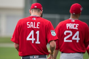 FORT MYERS, FL- FEBRUARY 14:  Chris Sale #41 and David Price #24 of the Boston Red Sox take the field during the first official day of workouts for pitchers and catchers on February 14, 2017 at jetBlue Park in Fort Myers, Florida.   (Photo by Michael Ivin