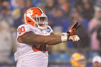 CHARLOTTE, NC - DECEMBER 01:  Dexter Lawrence #90 of the Clemson Tigers reacts against the Pittsburgh Panthers in the first quarter during their game at Bank of America Stadium on December 1, 2018 in Charlotte, North Carolina.  (Photo by Grant Halverson/G