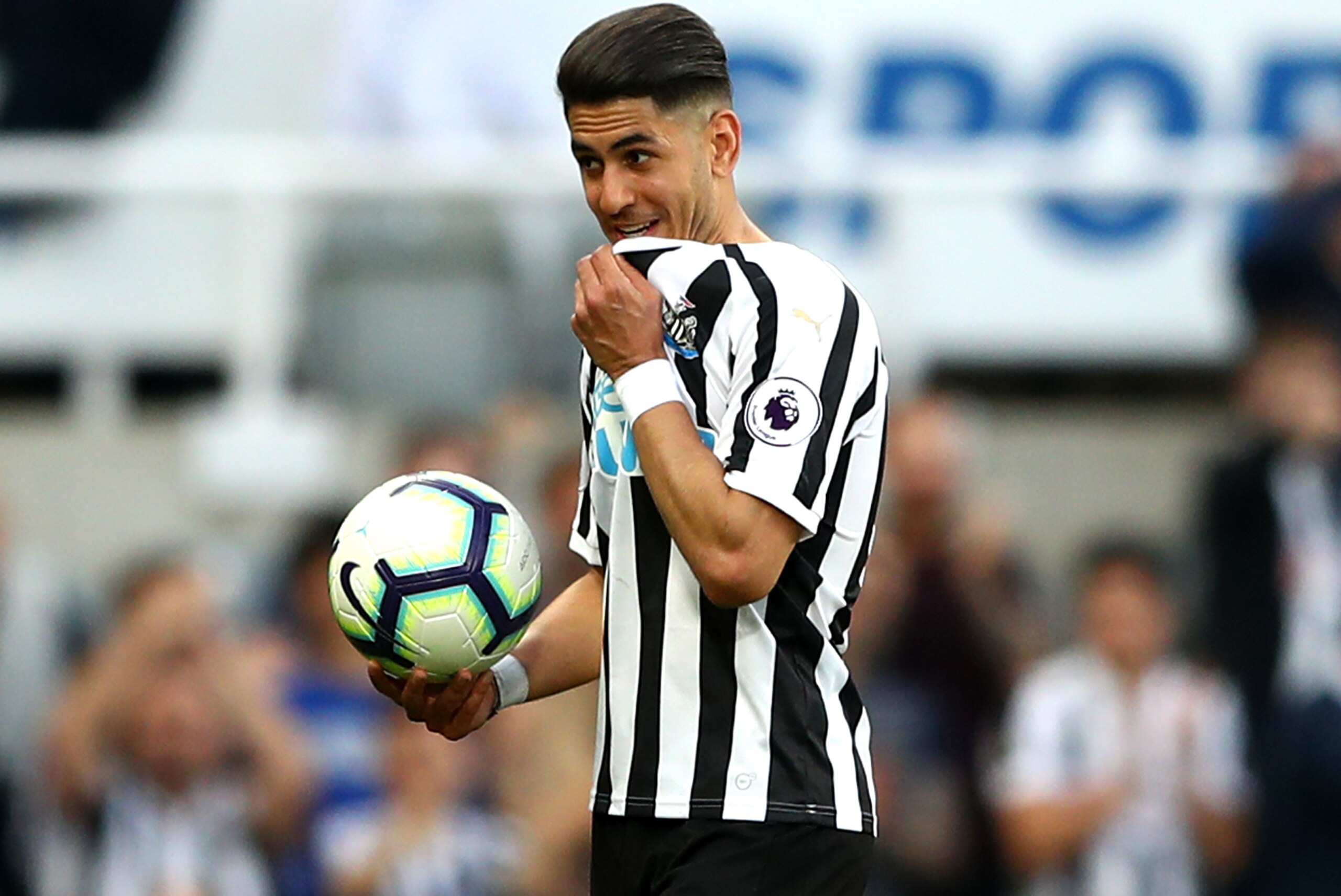 NEWCASTLE UPON TYNE, ENGLAND - APRIL 20: Ayoze Perez of Newcastle United leaves the pitch with the match ball following his hat-trick during the Premier League match between Newcastle United and Southampton FC at St. James Park on April 20, 2019 in Newcas