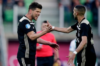 GRONINGEN, NETHERLANDS - APRIL 20: Klaas Jan Huntelaar of Ajax celebrates 0-1 with Hakim Ziyech of Ajax  during the Dutch Eredivisie  match between FC Groningen v Ajax at the Hitachi Capital Mobility Stadion on April 20, 2019 in Groningen Netherlands (Pho