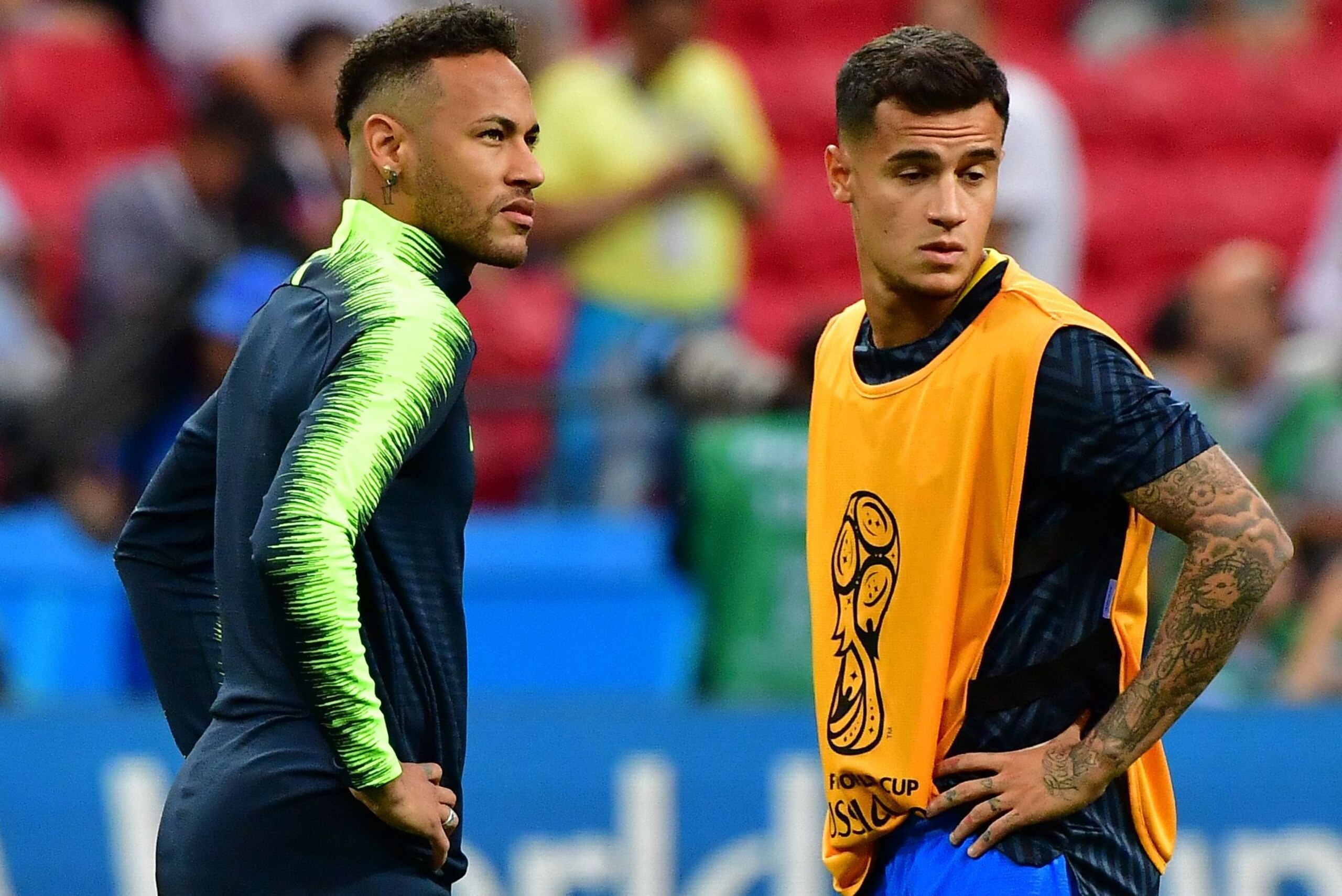 Brazil's forward Neymar (L) and Brazil's forward Philippe Coutinho  warm up prior to the Russia 2018 World Cup quarter-final football match between Brazil and Belgium at the Kazan Arena in Kazan on July 6, 2018. (Photo by Luis Acosta / AFP) / RESTRICTED T