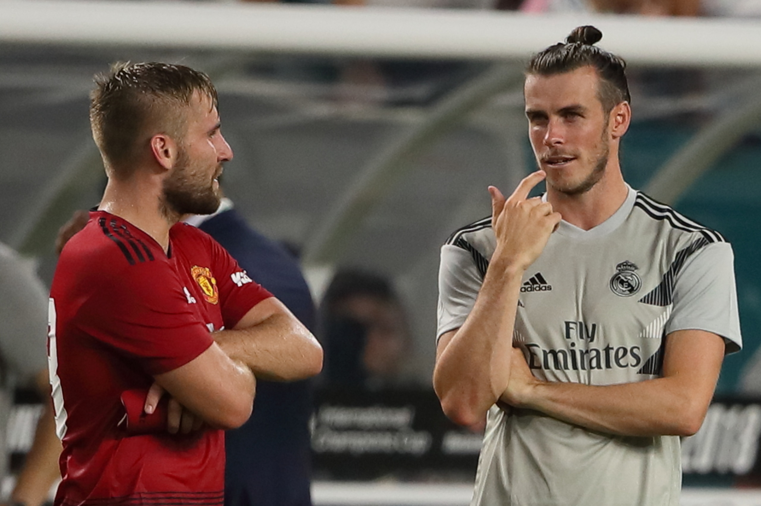 MIAMI, FL - JULY 31:  Luke Shaw of Manchester United talks to Gareth Bale of Real Madrid during the International Champions Cup 2018 fixture between Manchester United v Real Madrid at Hard Rock Stadium on July 31, 2018 in Miami, Florida. (Photo by Matthew