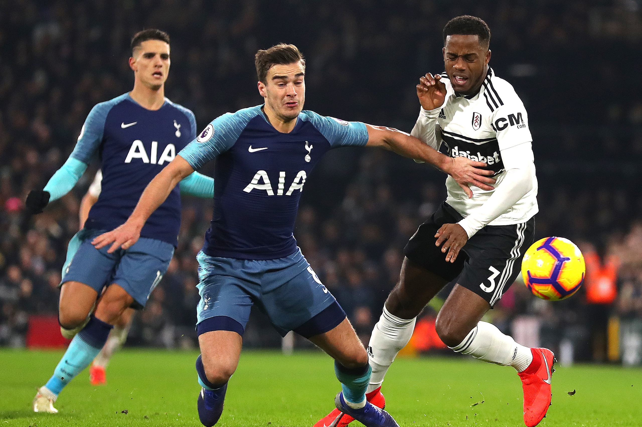 LONDON, ENGLAND - JANUARY 20:  Harry Winks of Tottenham tackles Ryan Sessegnon of Fulham during the Premier League match between Fulham FC and Tottenham Hotspur at Craven Cottage on January 20, 2019 in London, United Kingdom. (Photo by Catherine Ivill/Get