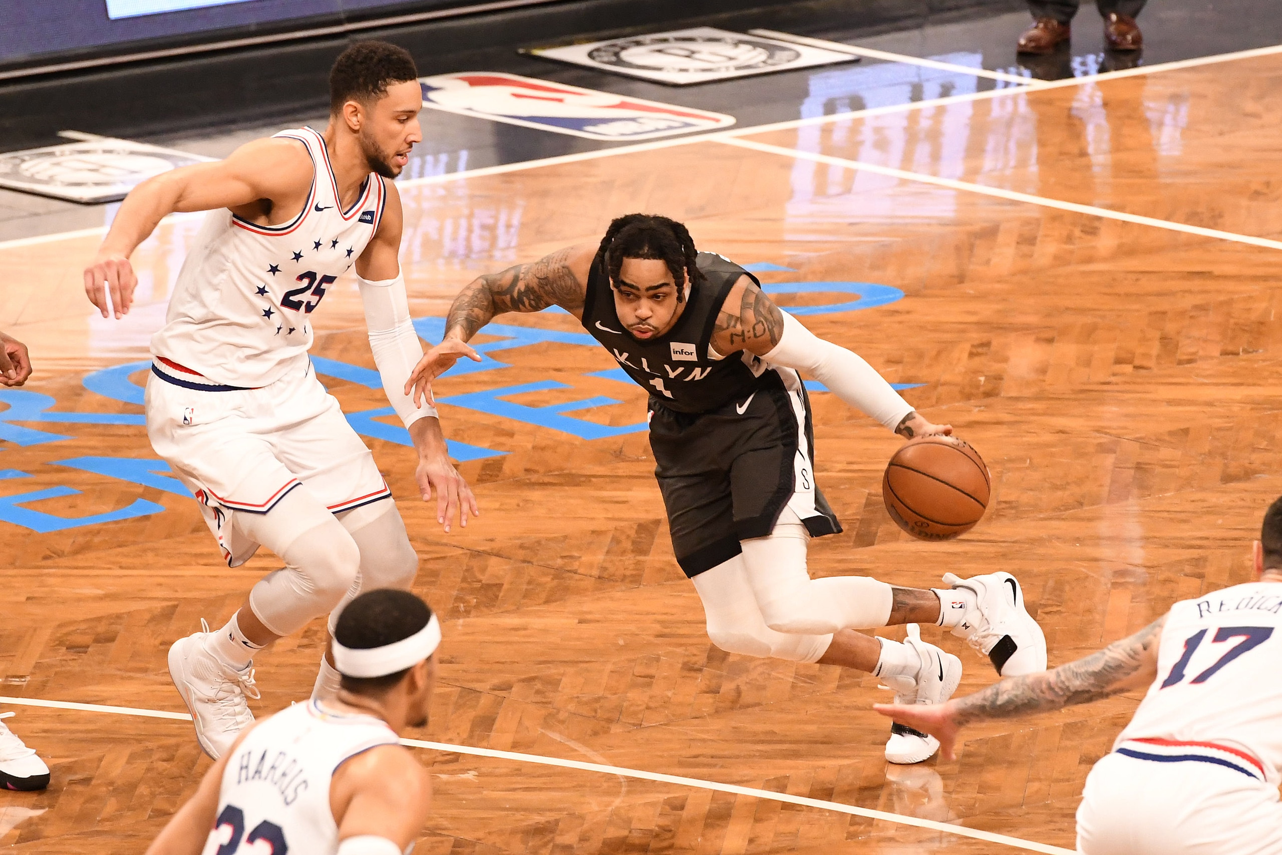 NEW YORK, NY - APRIL 20: D'Angelo Russell #1 of the Brooklyn Nets handles the ball against Ben Simmons #25 of the Philadelphia 76ers during Game Four of Round One of the 2019 NBA Playoffs at Barclays Center on April 20, 2019 in the Brooklyn borough of New
