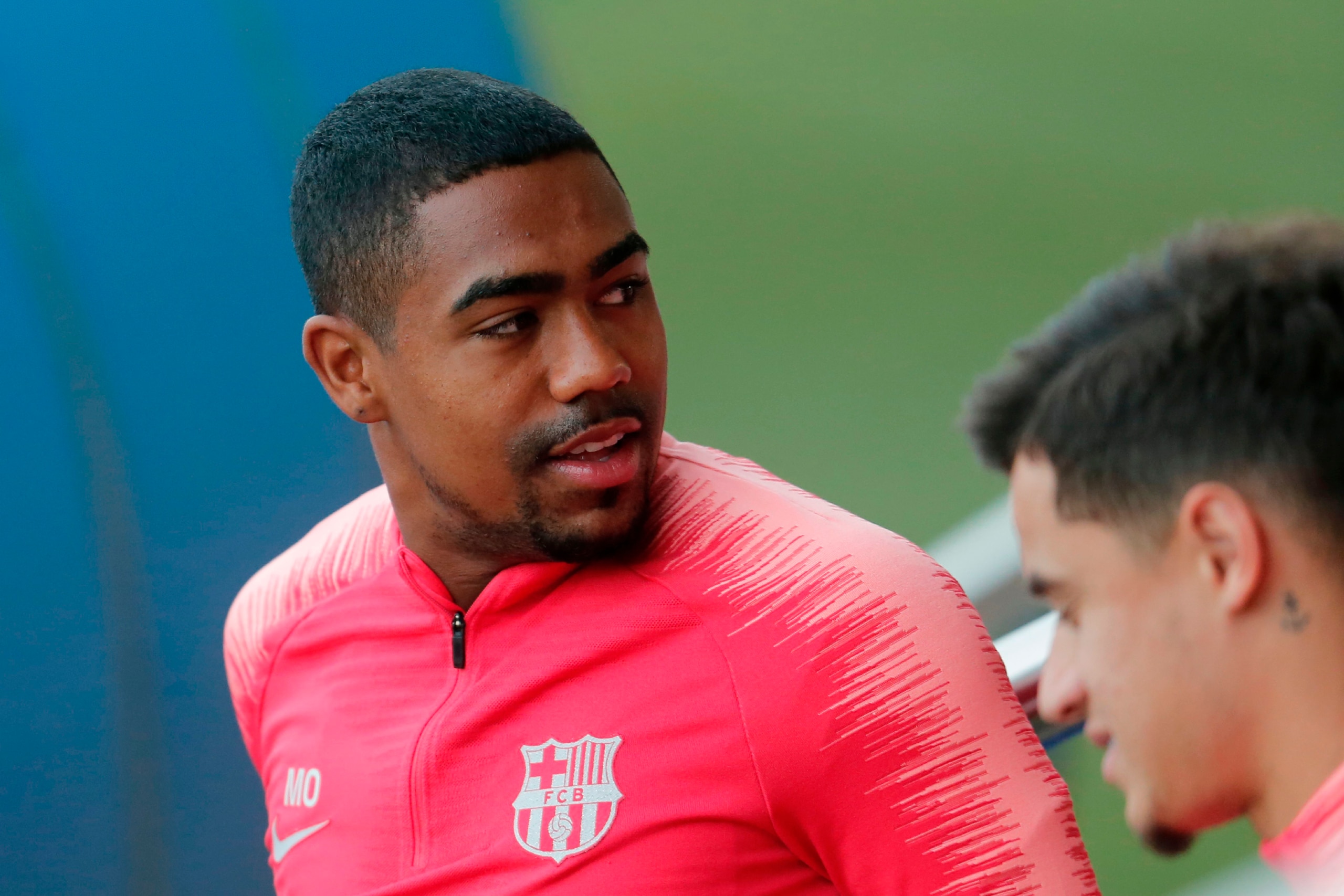 Barcelona's Brazilian midfielder Malcom and Barcelona's Brazilian midfielder Philippe Coutinho attend a training session at the Joan Gamper Sports Center in Sant Joan Despi on April 15, 2019 on the eve of the Champions League second leg quarter-final foot