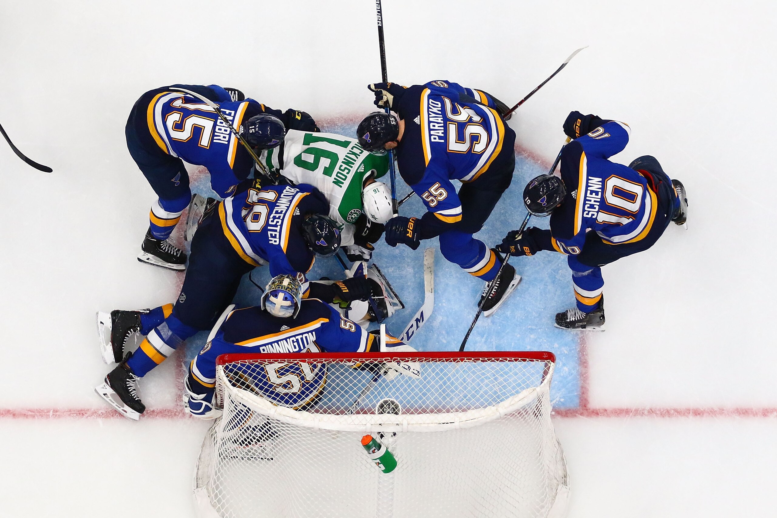 ST. LOUIS, MO - APRIL 25: Jordan Binnington #50, Jay Bouwmeester #19, Robby Fabbri #15, Colton Parayko #55, and Brayden Schenn #10 defend the goal against Jason Dickinson #16 of the Dallas Stars in Game One of the Western Conference Second Round during th
