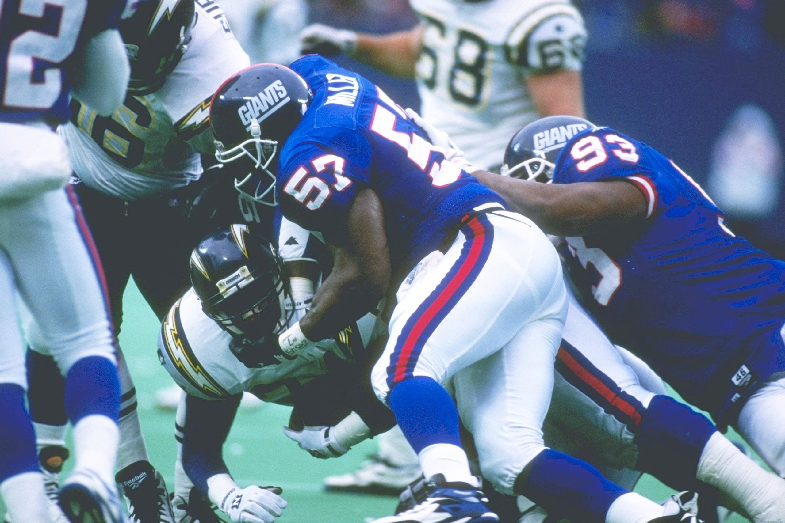 23 Dec 1995:  Linebacker Corey Miller of the New York Giants makes a tackle during a game against the San Diego Chargers at Giants Stadium in East Rutherford, New Jersey.  The Chargers won the game, 27-17. Mandatory Credit: Al Bello  /Allsport