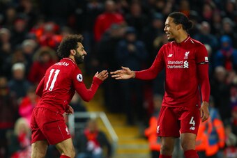 LIVERPOOL, ENGLAND - APRIL 26: Mohamed Salah of Liverpool celebrates after scoring a goal to make it 5-0 during the Premier League match between Liverpool FC and Huddersfield Town at Anfield on April 26, 2019 in Liverpool, United Kingdom. (Photo by Robbie