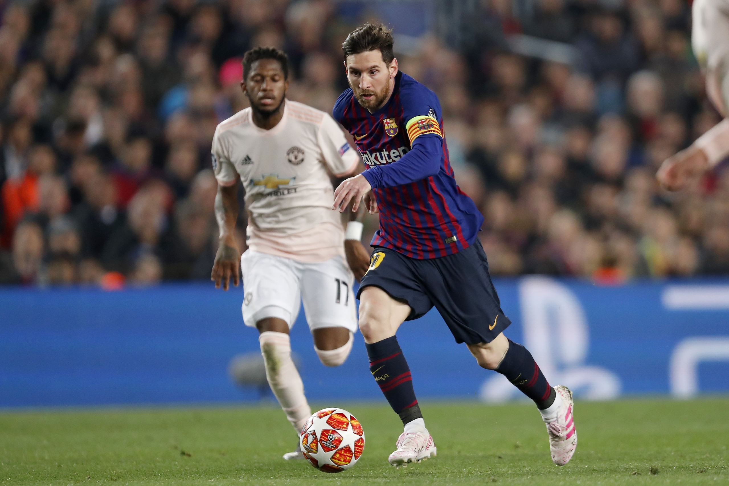 (L-R) Fred of Manchester United, Lionel Messi of FC Barcelona during the UEFA Champions League quarter final match between FC Barcelona and Manchester United FC at Camp Nou on April 16, 2019 in Barcelona, Spain(Photo by VI Images via Getty Images)