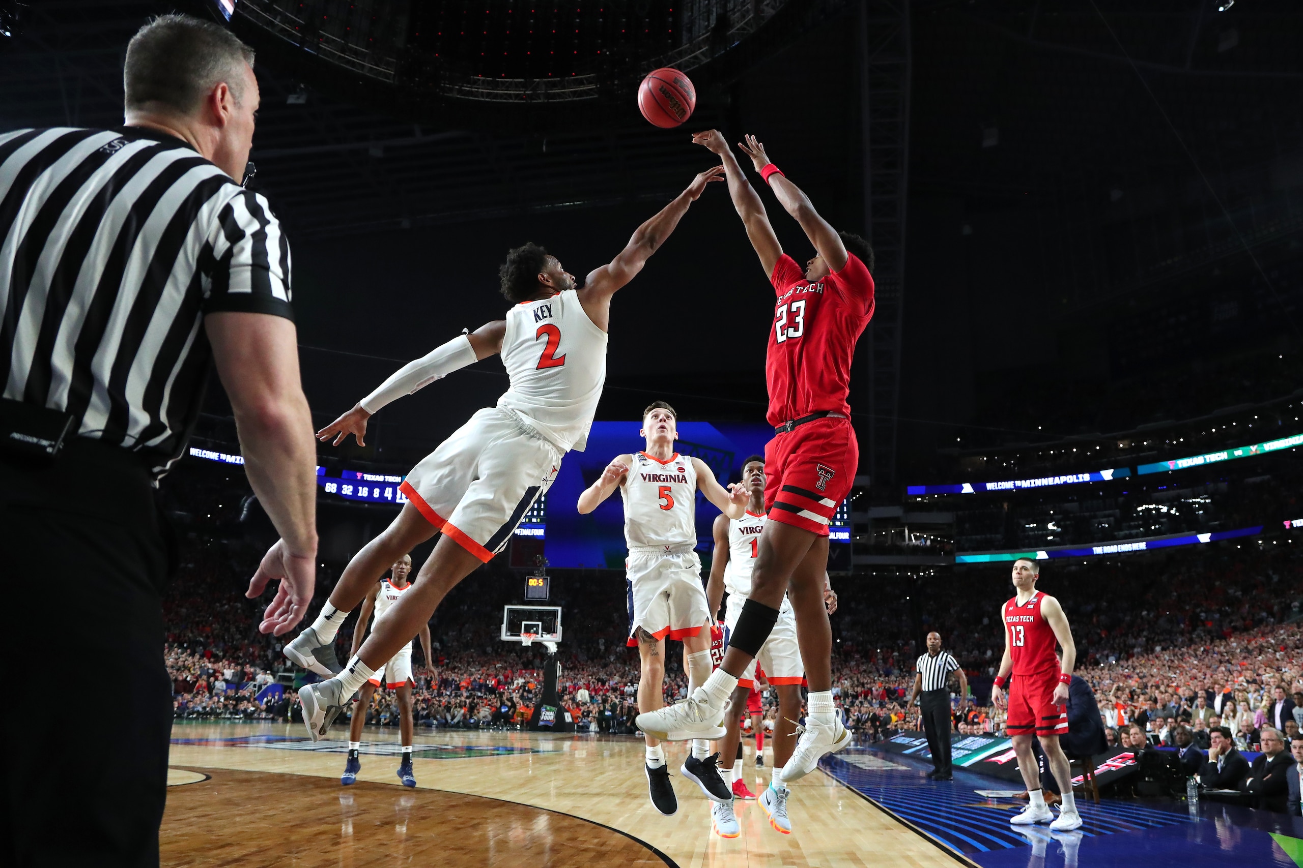 MINNEAPOLIS, MINNESOTA - APRIL 08:  Jarrett Culver #23 of the Texas Tech Red Raiders attempts a shot against Braxton Key #2 of the Virginia Cavaliers during the 2019 NCAA men's Final Four National Championship game at U.S. Bank Stadium on April 08, 2019 i