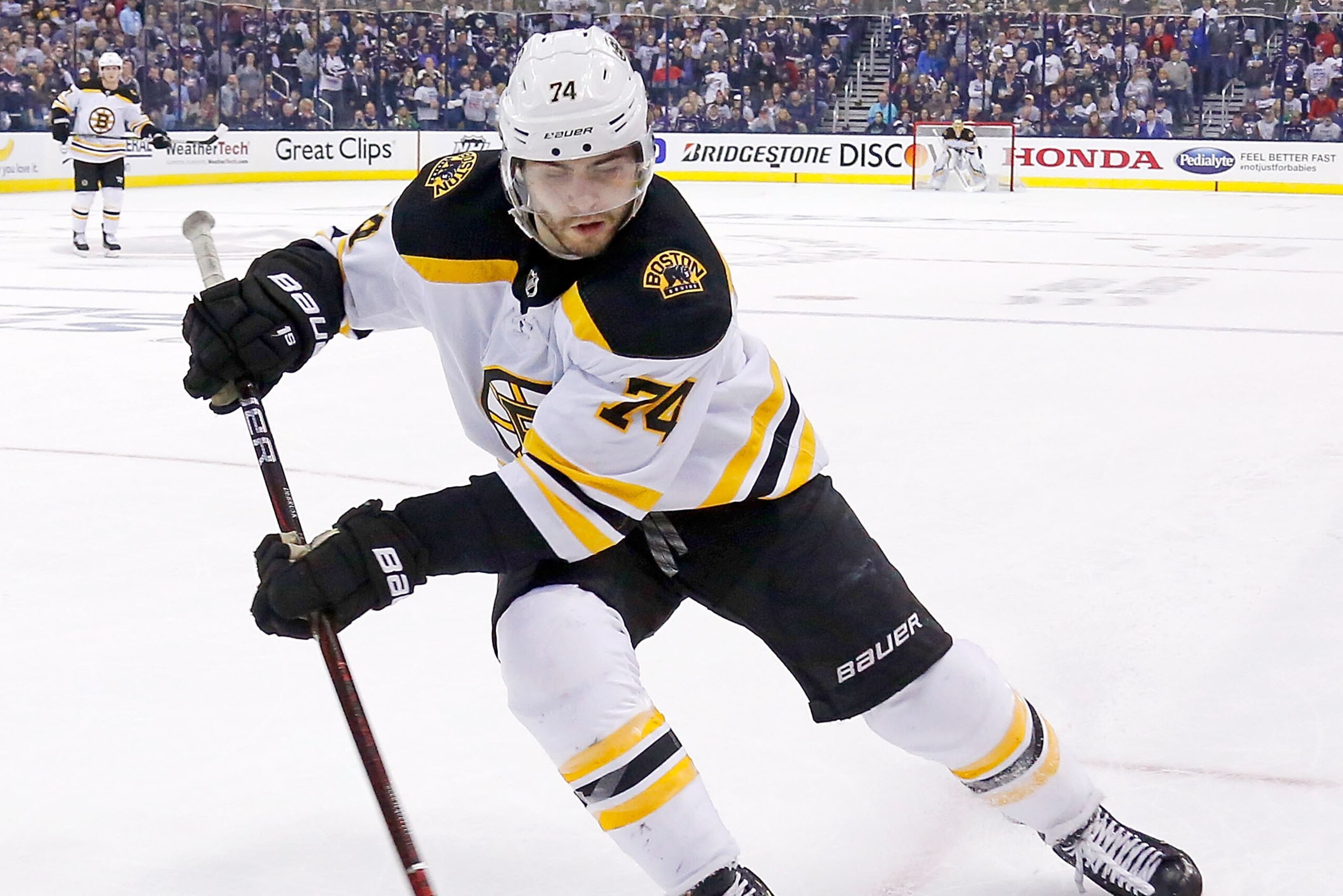 COLUMBUS, OH - APRIL 30:  Jake DeBrusk #74 of the Boston Bruins controls the puck while playing against the Columbus Blue Jackets in Game Three of the Eastern Conference Second Round during the 2019 NHL Stanley Cup Playoffs on April 30, 2019 at Nationwide