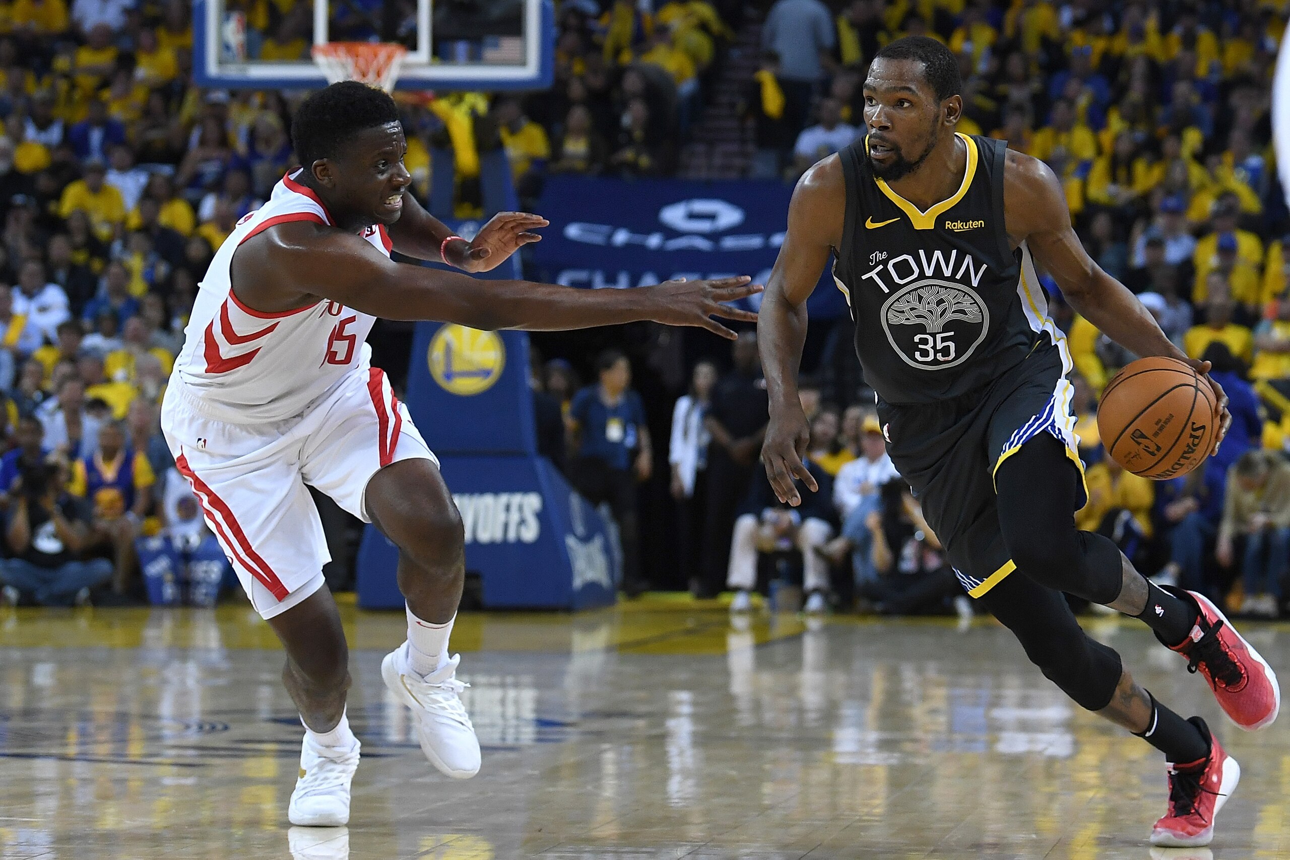 OAKLAND, CA - APRIL 30:  Kevin Durant #35 of the Golden State Warriors drives on Clint Capela #15 of the Houston Rockets in Game Two of the Second Round of the 2019 NBA Western Conference Playoffs at ORACLE Arena on April 30, 2019 in Oakland, California. 