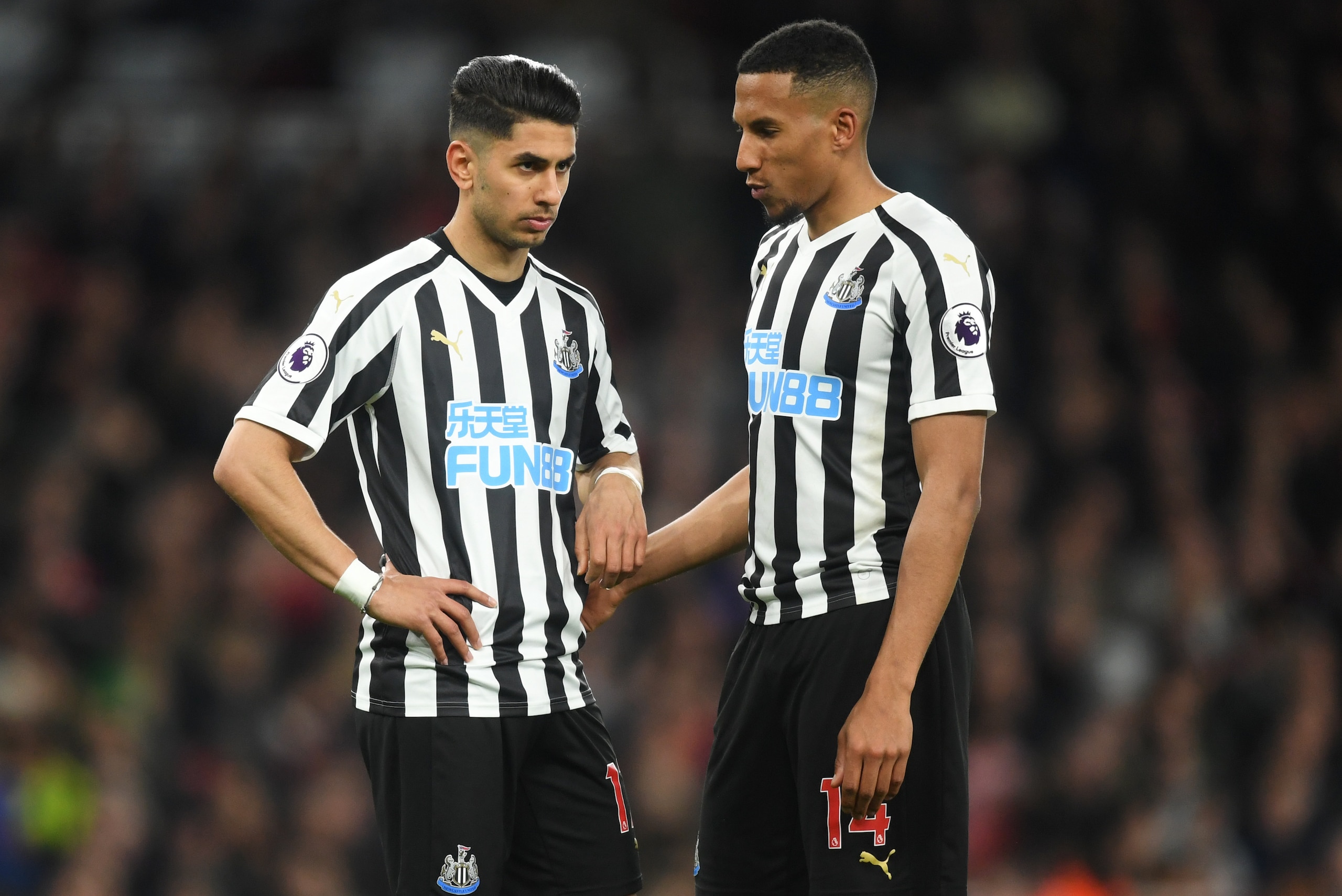 LONDON, ENGLAND - APRIL 01:  Ayoze Perez and Isaac Hayden of Newcastle United in discussion during the Premier League match between Arsenal FC and Newcastle United at Emirates Stadium on April 01, 2019 in London, United Kingdom. (Photo by Michael Regan/Ge