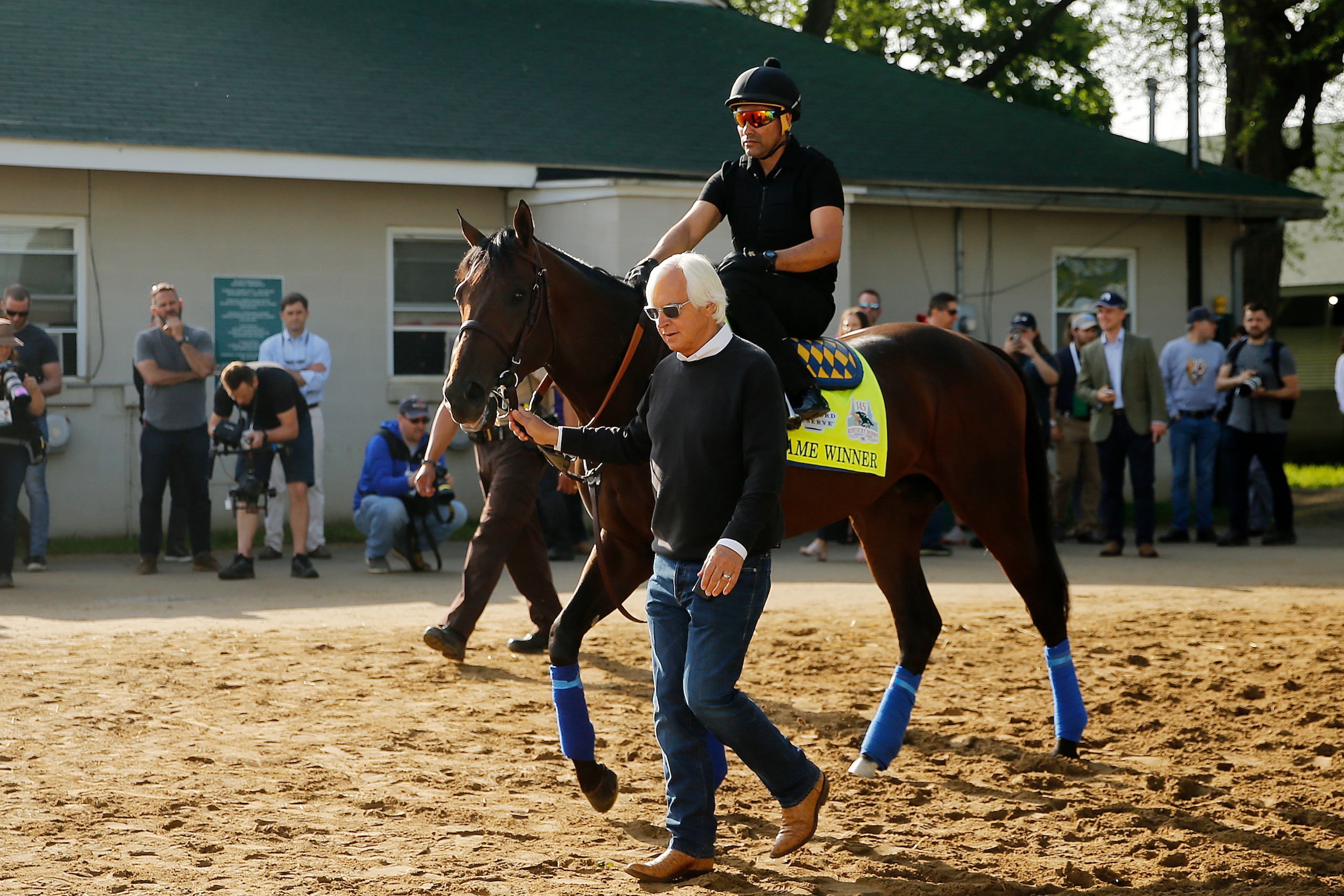 LOUISVILLE, KENTUCKY - MAY 02: Trainer Bob Baffert leads Game Winner to the track for morning workouts in preparation for the 145th running of the Kentucky Derby at Churchill Downs on May 2, 2019 in Louisville, Kentucky. (Photo by Michael Reaves/Getty Ima