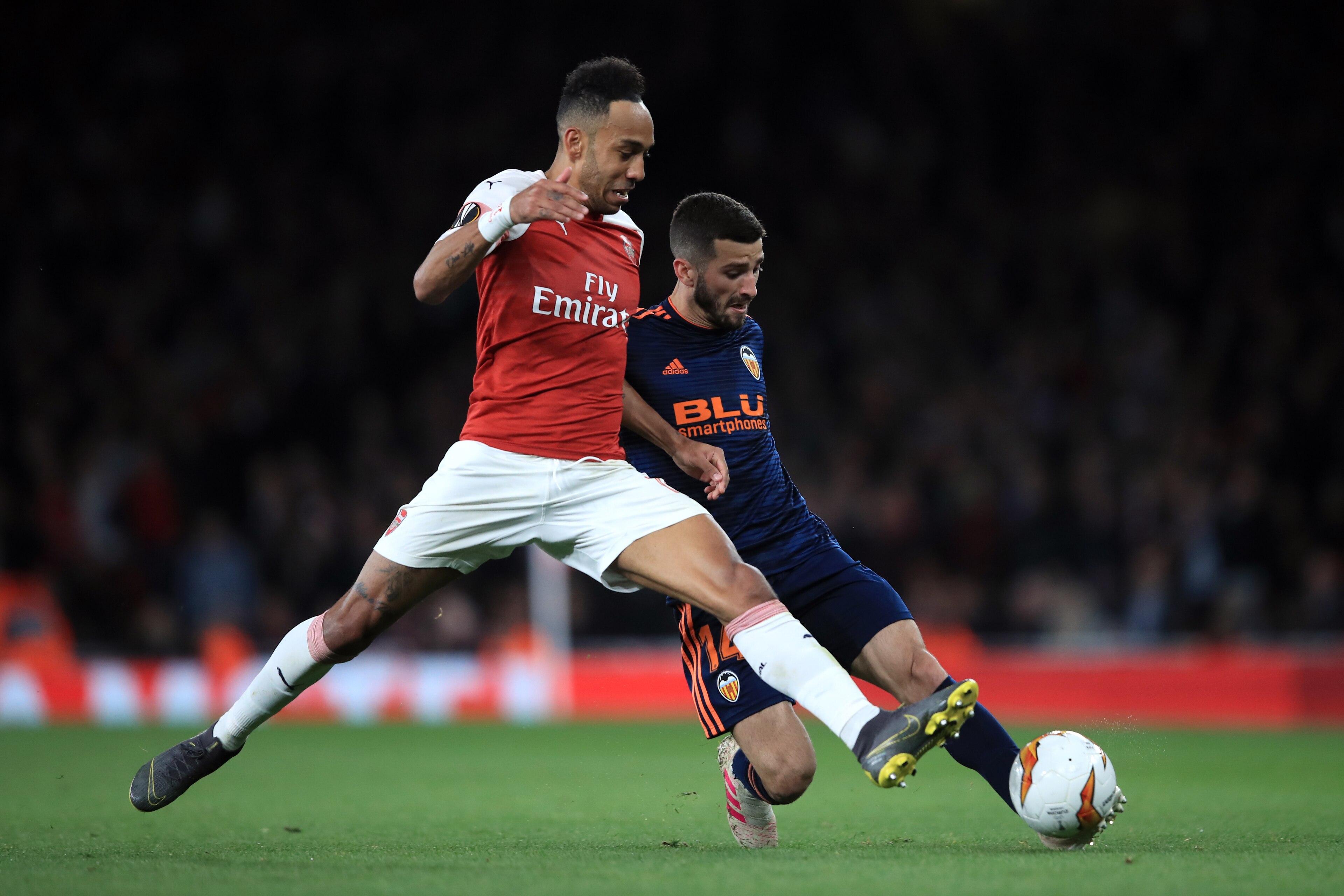 LONDON, ENGLAND - MAY 02: Pierre-Emerick Aubameyang of Arsenal in action with Jose Luis Gaya of Valencia CF during the UEFA Europa League Semi Final First Leg match between Arsenal and Valencia at Emirates Stadium on May 2, 2019 in London, England. (Photo
