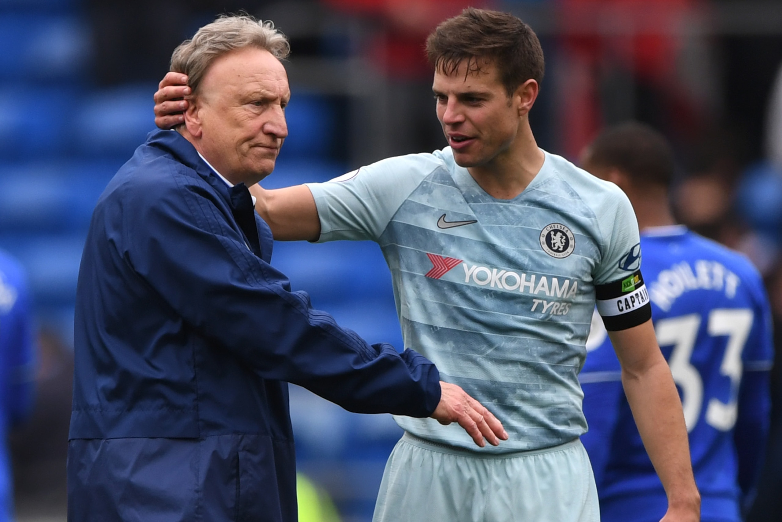 CARDIFF, WALES - MARCH 31: Cardiff manager Neil Warnock is consoled by Chelsea captain Cesar Azpilicueta after the Premier League match between Cardiff City and Chelsea FC at Cardiff City Stadium on March 31, 2019 in Cardiff, United Kingdom. (Photo by Stu