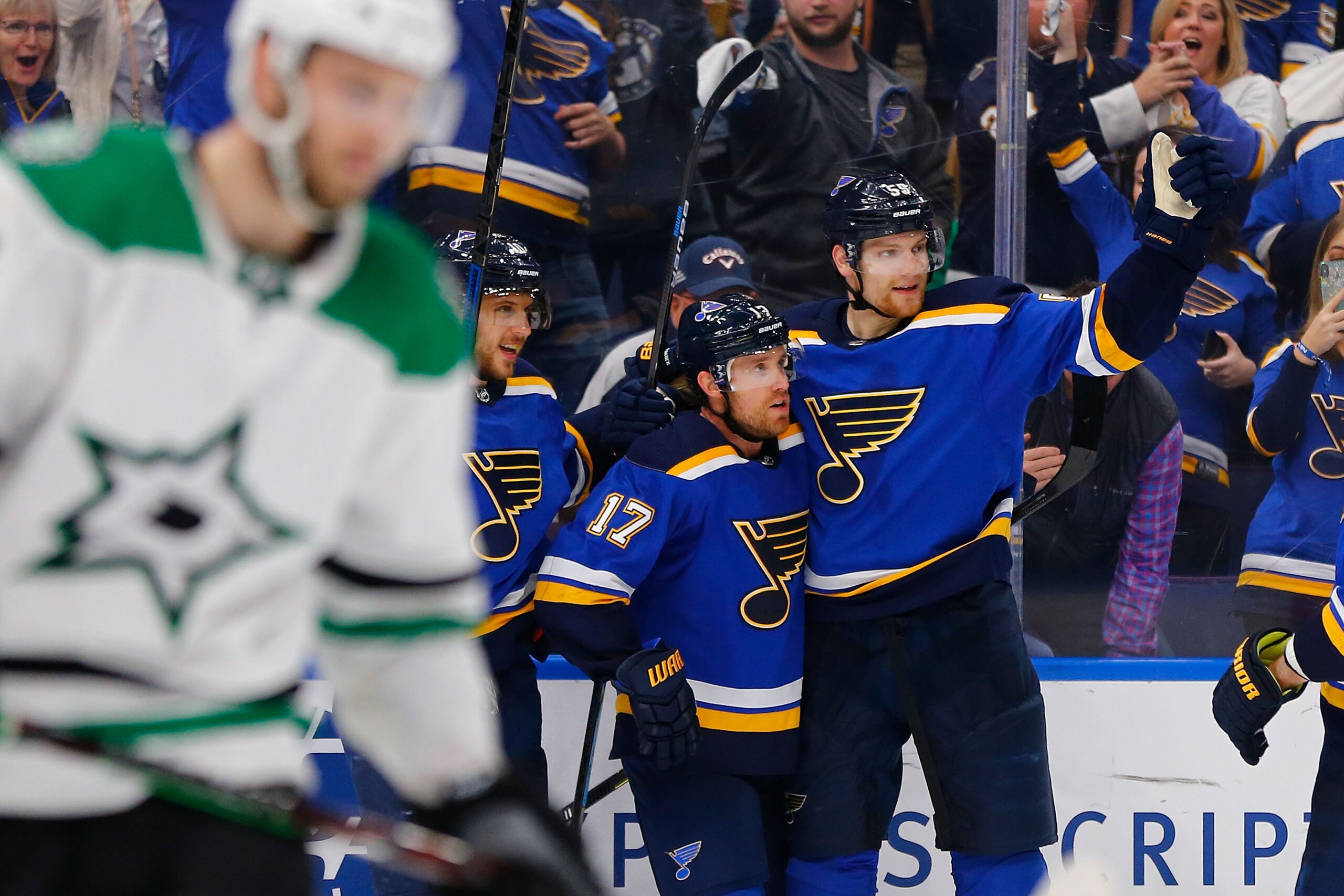 ST. LOUIS, MO - MAY 3:Jaden Schwartz #17 and Colton Parayko #55 of the St. Louis Blues celebrate after Schwartz scored a goal against the Dallas Stars  in Game Five of the Western Conference Second Round during the 2019 NHL Stanley Cup Playoffs at the Ent