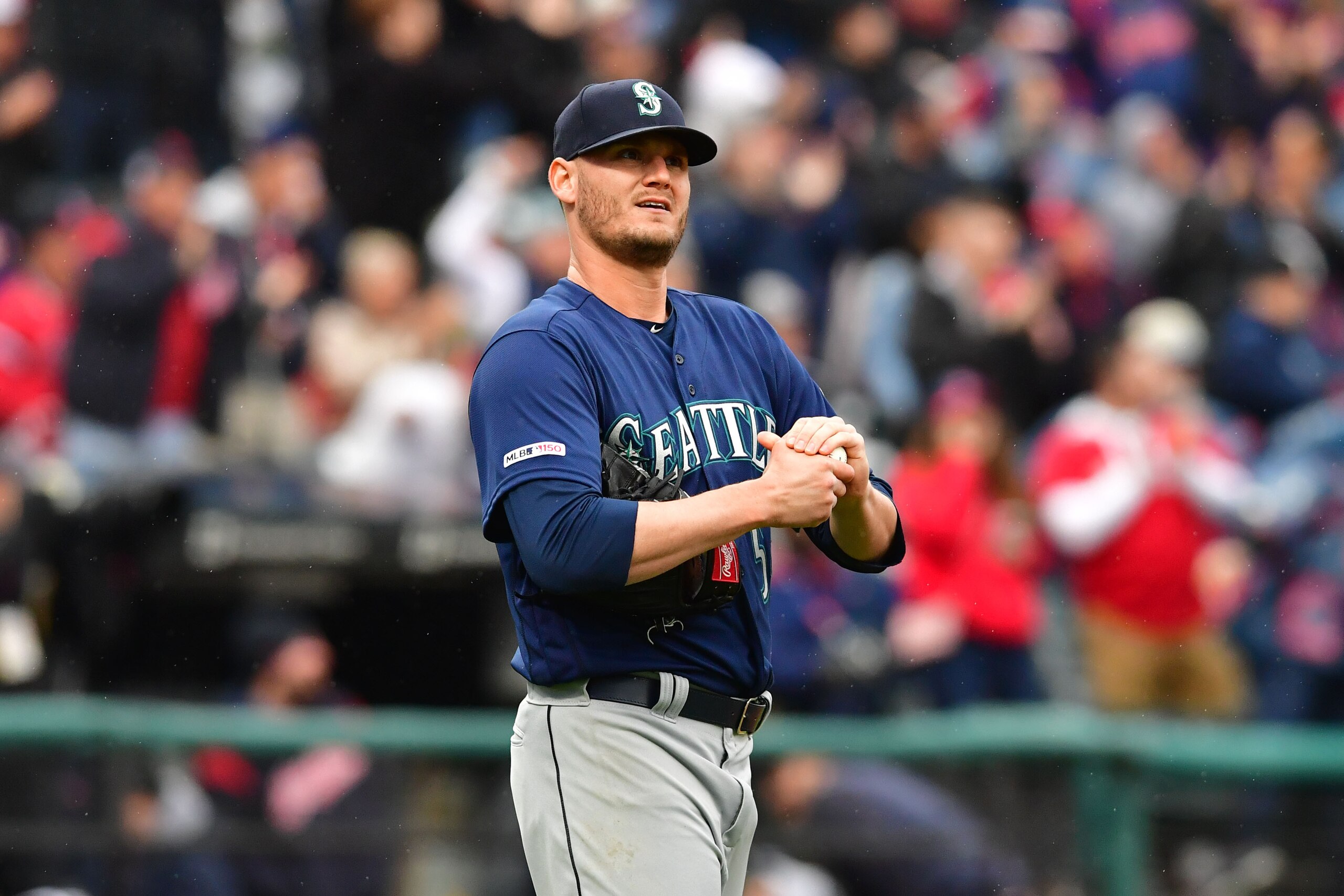 CLEVELAND, OHIO - MAY 04: Connor Sadzeck #54 of the Seattle Mariners reacts after giving up a two run home run to Carlos Santana #41 of the Cleveland Indians during the eighth inning at Progressive Field on May 04, 2019 in Cleveland, Ohio. The Indians def