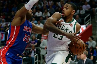 DETROIT, MI - APRIL 22:  Wayne Ellington #20 of the Detroit Pistons puts the pressure on Sterling Brown #23 of the Milwaukee Bucks during the second half of Game Four of the first round of the 2019 NBA Eastern Conference Playoffs at Little Caesars Arena o