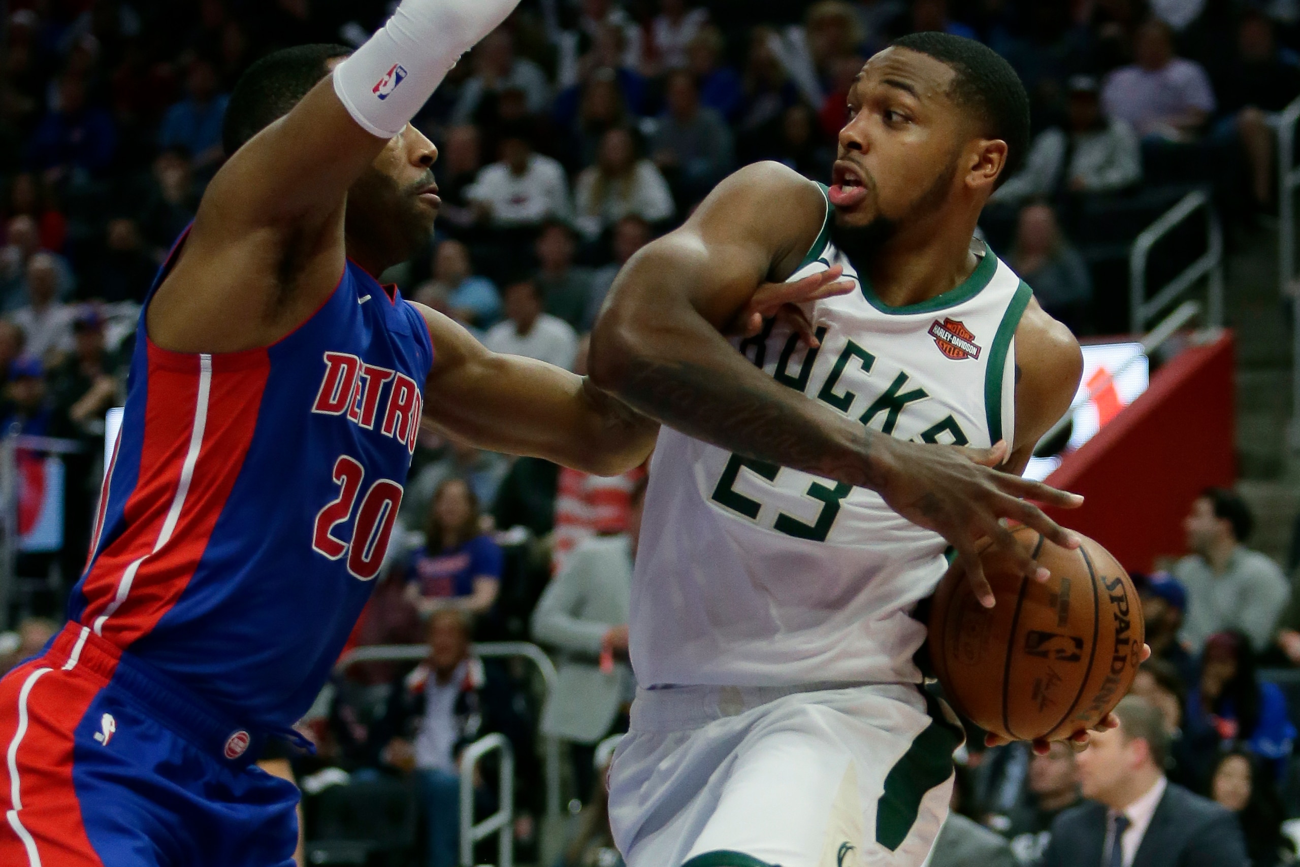 DETROIT, MI - APRIL 22: Wayne Ellington #20 of the Detroit Pistons puts the pressure on Sterling Brown #23 of the Milwaukee Bucks during the second half of Game Four of the first round of the 2019 NBA Eastern Conference Playoffs at Little Caesars Arena o DETROIT, MI - APRIL 22: Wayne Ellington #20 of the Detroit Pistons puts the pressure on Sterling Brown #23 of the Milwaukee Bucks during the second half of Game Four of the first round of the 2019 NBA Eastern Conference Playoffs at Little Caesars Arena o