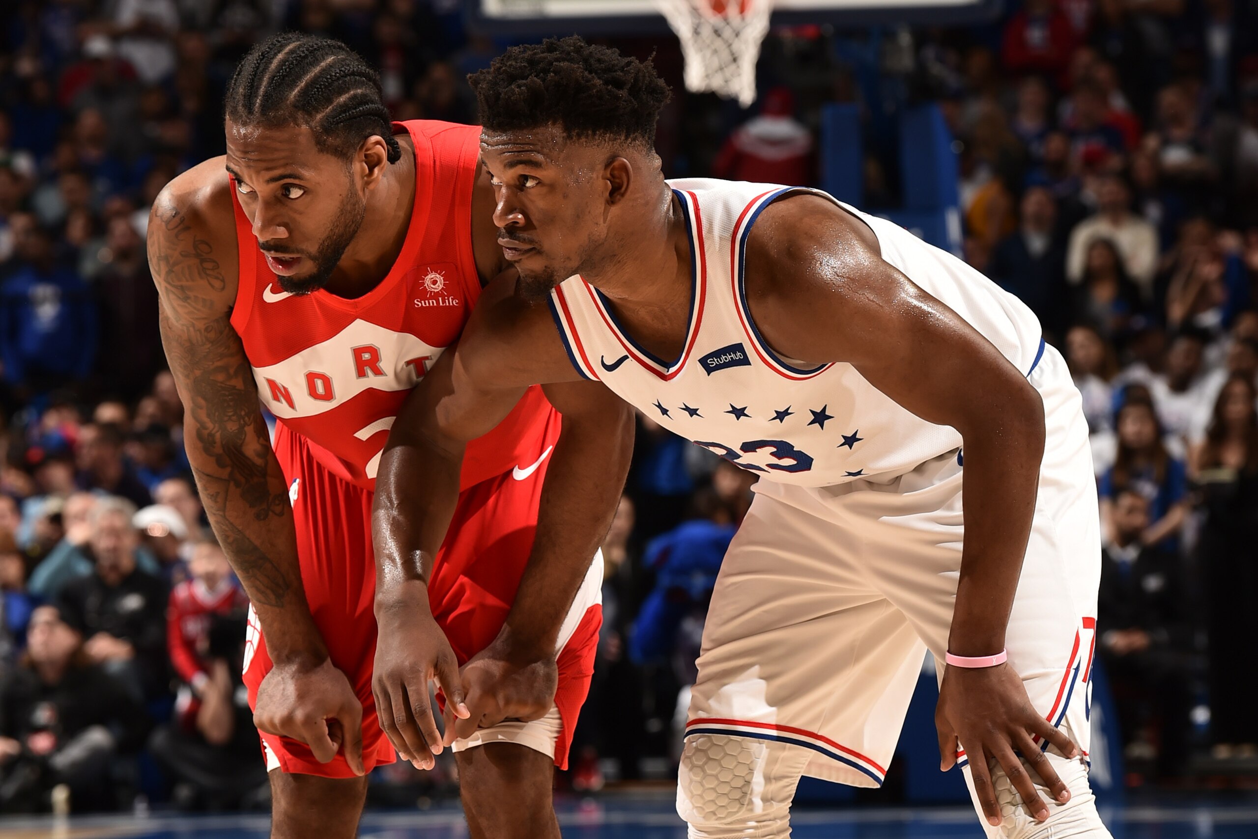 PHILADELPHIA, PA - MAY 5: Kawhi Leonard #2 and Jimmy Butler #23 of the Philadelphia 76ers defend their positions  during Game Four of the Eastern Conference Semifinals of the 2019 NBA Playoffs on May 5, 2019 at the Wells Fargo Center in Philadelphia, Penn