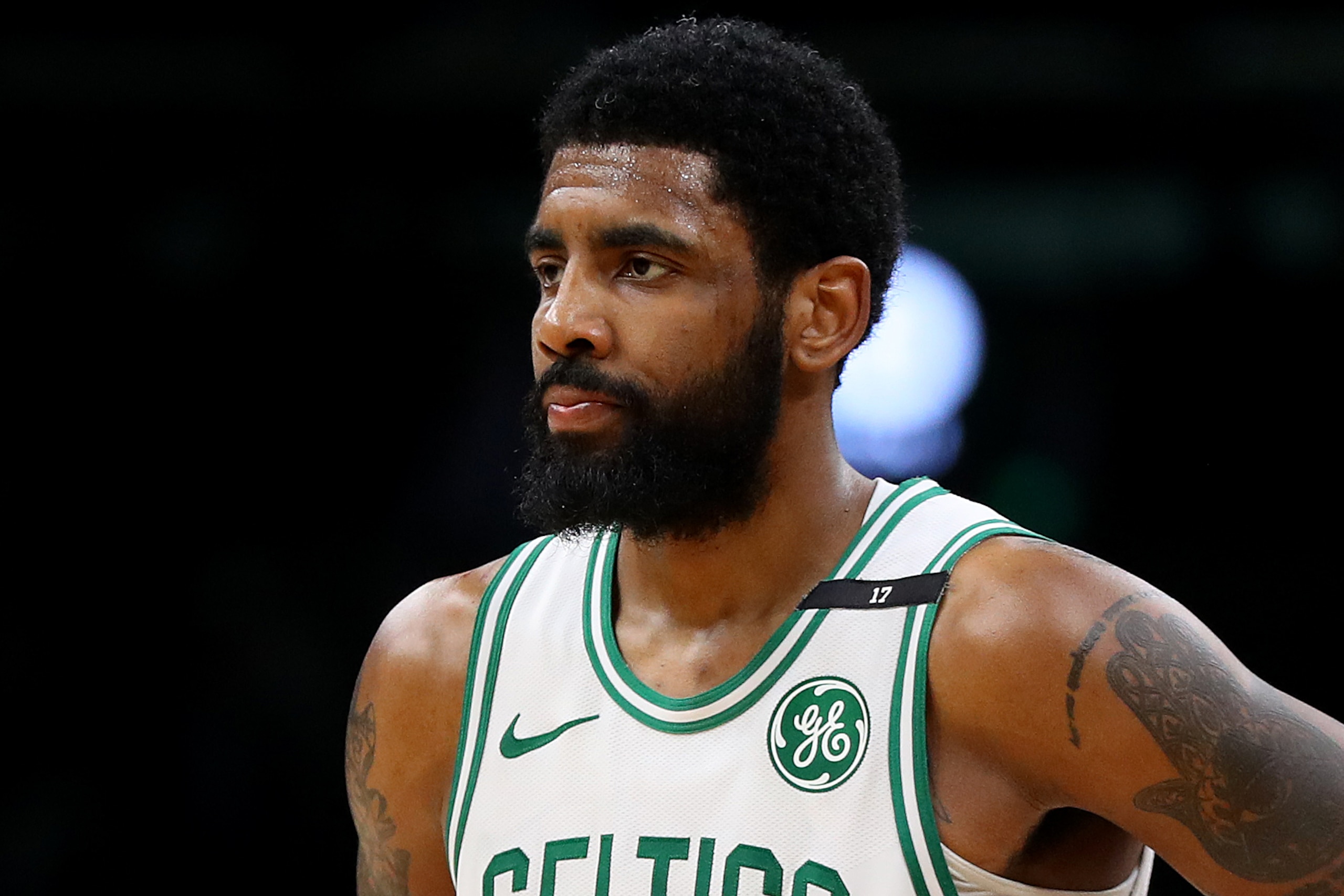 BOSTON, MASSACHUSETTS - MAY 06: Kyrie Irving #11 of the Boston Celtics looks on during the second half of Game 4 of the Eastern Conference Semifinals against the Milwaukee Bucks during the 2019 NBA Playoffs at TD Garden on May 06, 2019 in Boston, Massachu