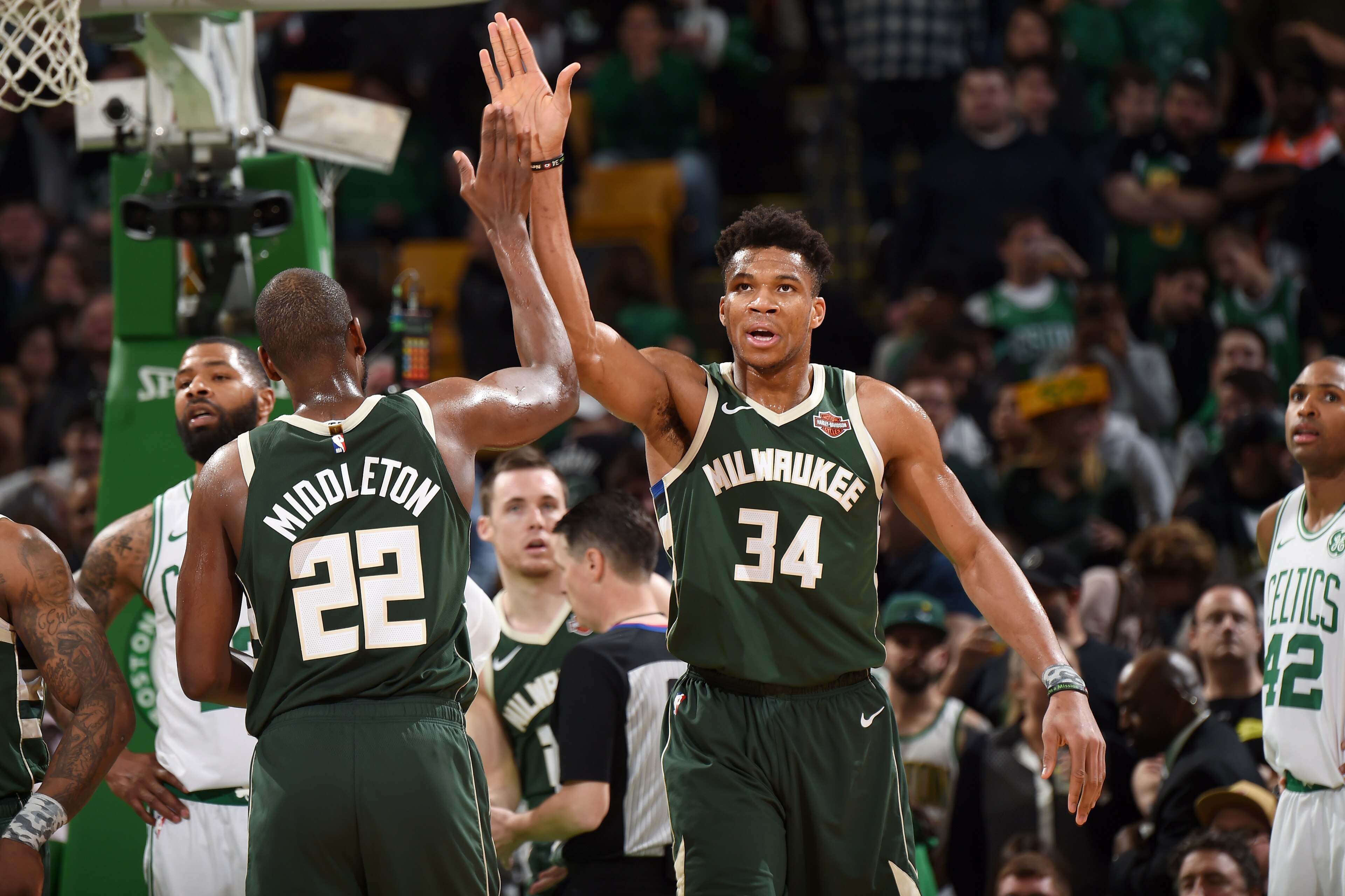 BOSTON, MA - MAY 6: Giannis Antetokounmpo #34 hi-fives Khris Middleton #22 of the Milwaukee Bucks during Game Four of the Eastern Conference Semifinals of the 2019 NBA Playoffs on May 6, 2019 at the TD Garden in Boston, Massachusetts. NOTE TO USER: User e BOSTON, MA - MAY 6: Giannis Antetokounmpo #34 hi-fives Khris Middleton #22 of the Milwaukee Bucks during Game Four of the Eastern Conference Semifinals of the 2019 NBA Playoffs on May 6, 2019 at the TD Garden in Boston, Massachusetts. NOTE TO USER: User e