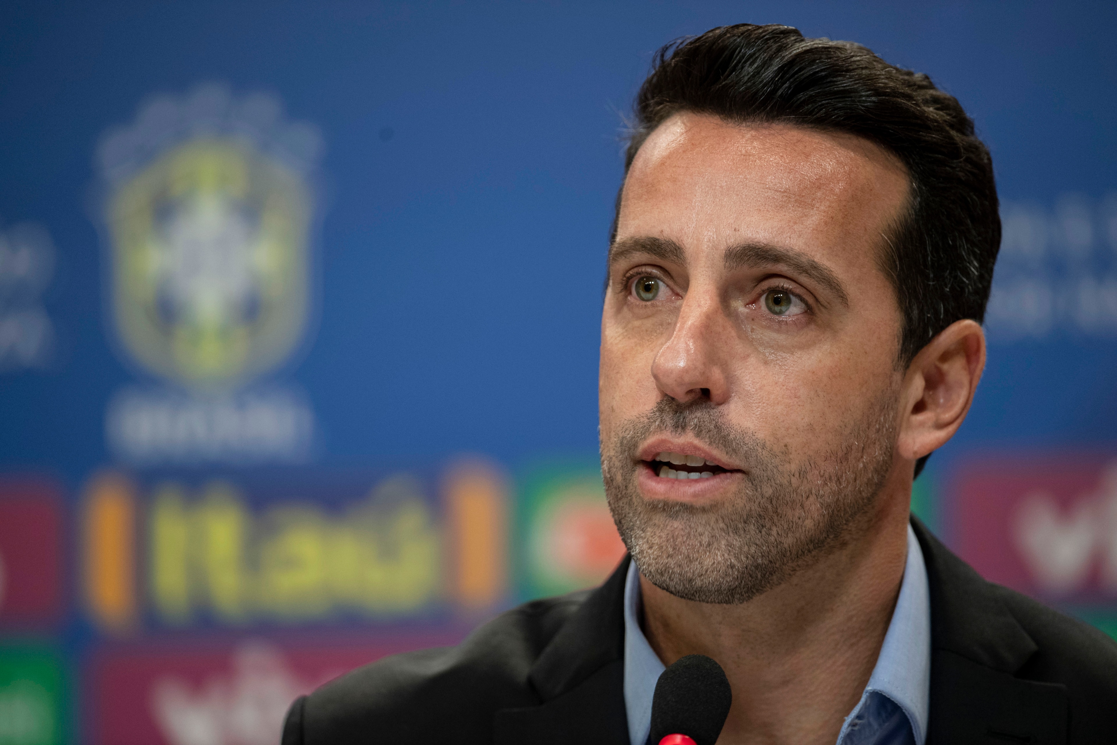 Brazil's Team Manager Edu Gaspar speaks during a press conference to announce his squad of players for the upcoming friendly matches against Saudi Arabia and Argentina in Rio de Janeiro, Brazil on September 21, 2018. (Photo by Mauro Pimentel / AFP)       