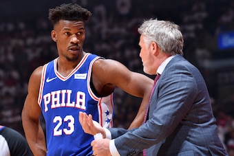 TORONTO, CANADA - MAY 7: Jimmy Butler #23 of the Philadelphia 76ers and Head Coach Brett Brown of the Philadelphia 76ers talk during a game against the Toronto Raptors during Game Five of the Eastern Conference Semifinals on May 7, 2019 at the Scotiabank 