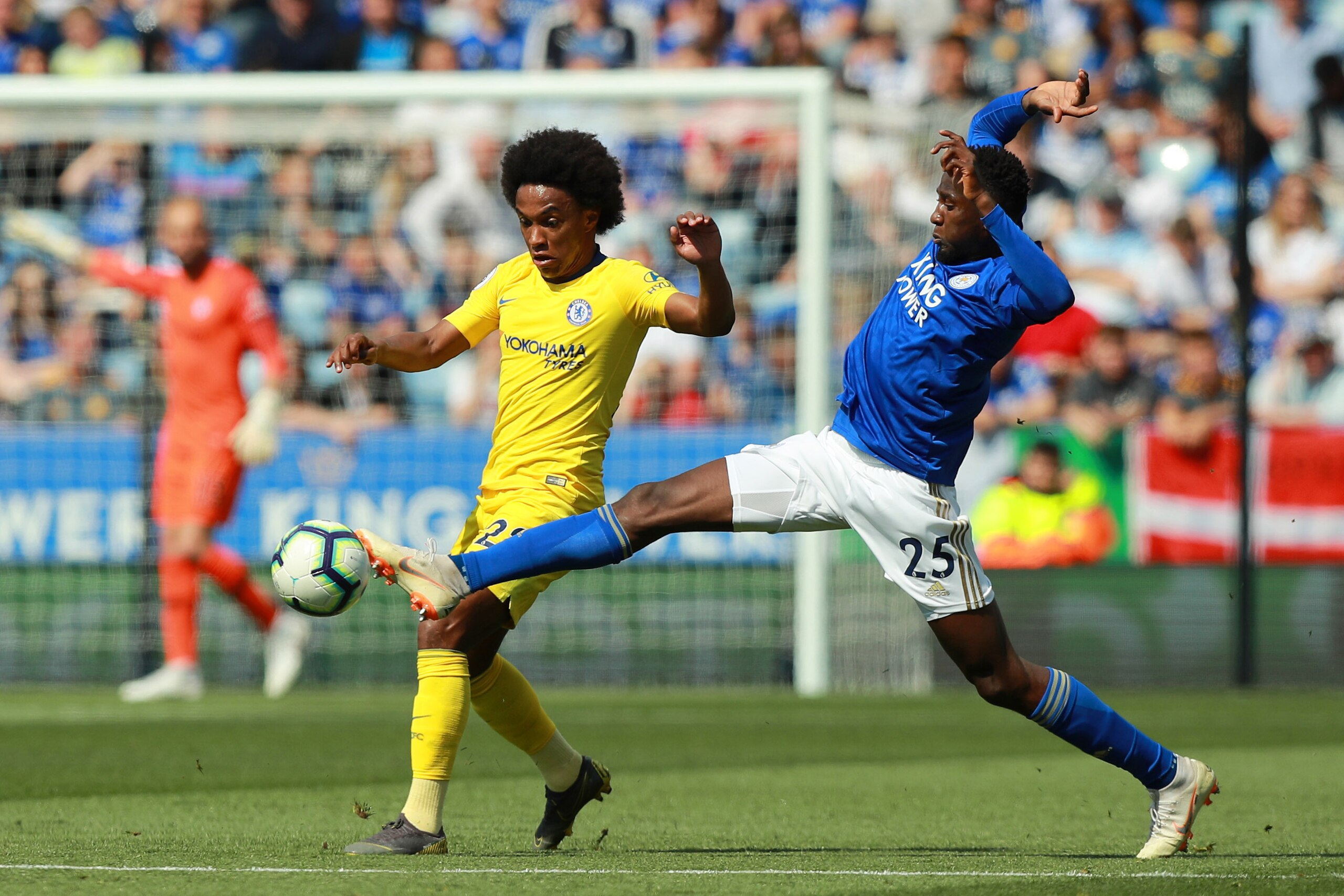 LEICESTER, ENGLAND - MAY 12:  Willian of Chelsea is challenged by Onyinye Wilfred Ndidi of Leicester City during the Premier League match between Leicester City and Chelsea FC at The King Power Stadium on May 12, 2019 in Leicester, United Kingdom. (Photo 