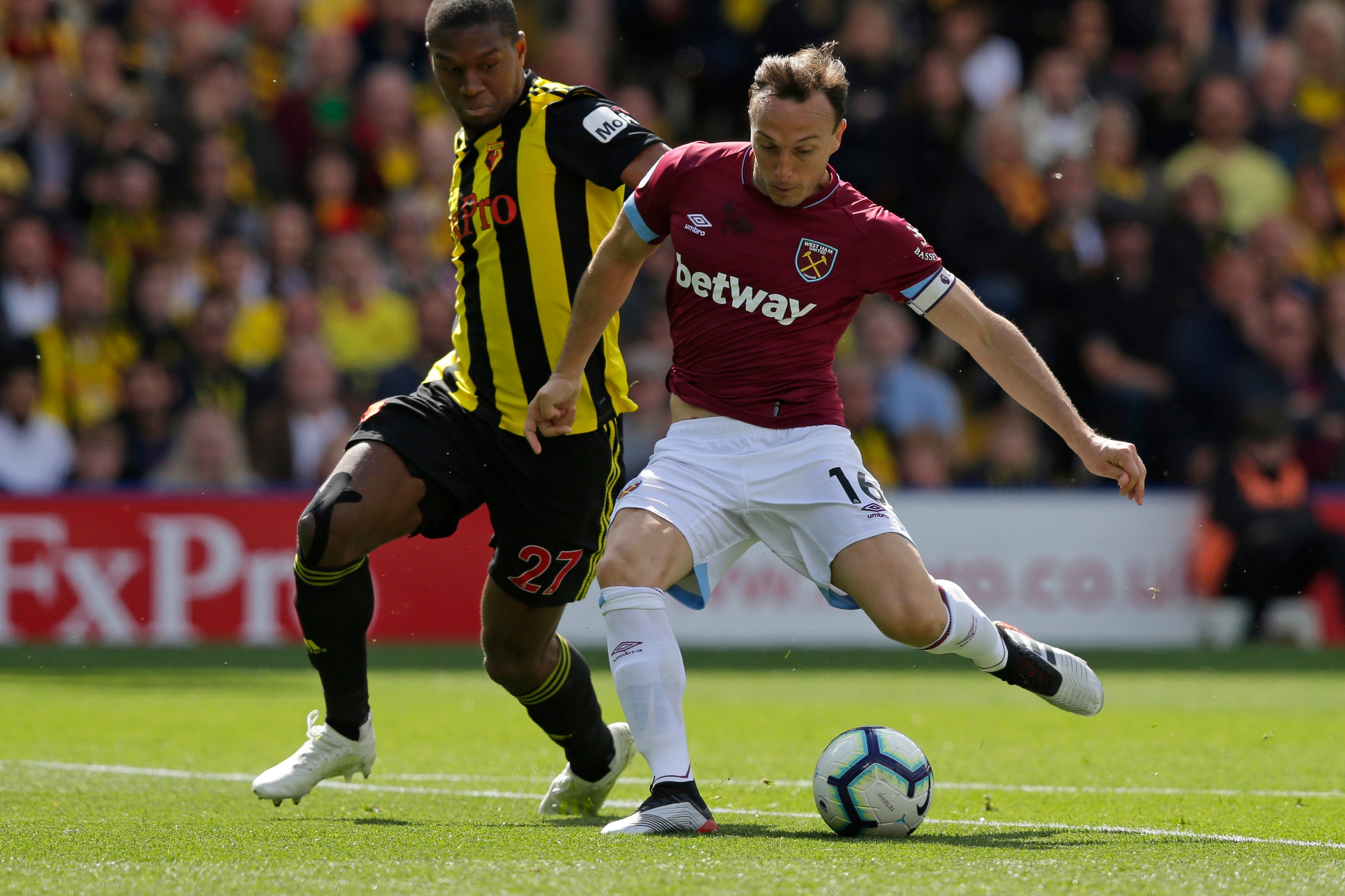 WATFORD, ENGLAND - MAY 12: Mark Noble of West Ham United scores their first goal during the Premier League match between Watford FC and West Ham United at Vicarage Road on May 12, 2019 in Watford, United Kingdom. (Photo by Henry Browne/Getty Images)