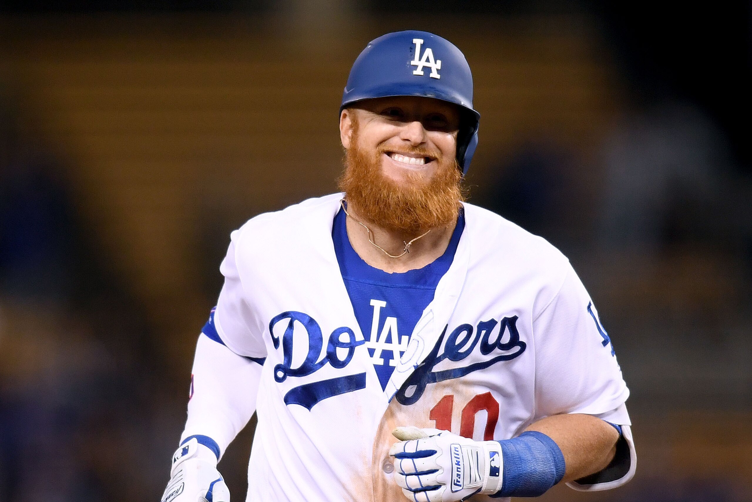 LOS ANGELES, CALIFORNIA - MAY 07:  Justin Turner #10 of the Los Angeles Dodgers reacts to his three run homerun, his third homerun of the game, for a 9-0 lead over the Atlanta Braves during the eighth inning at Dodger Stadium on May 07, 2019 in Los Angele