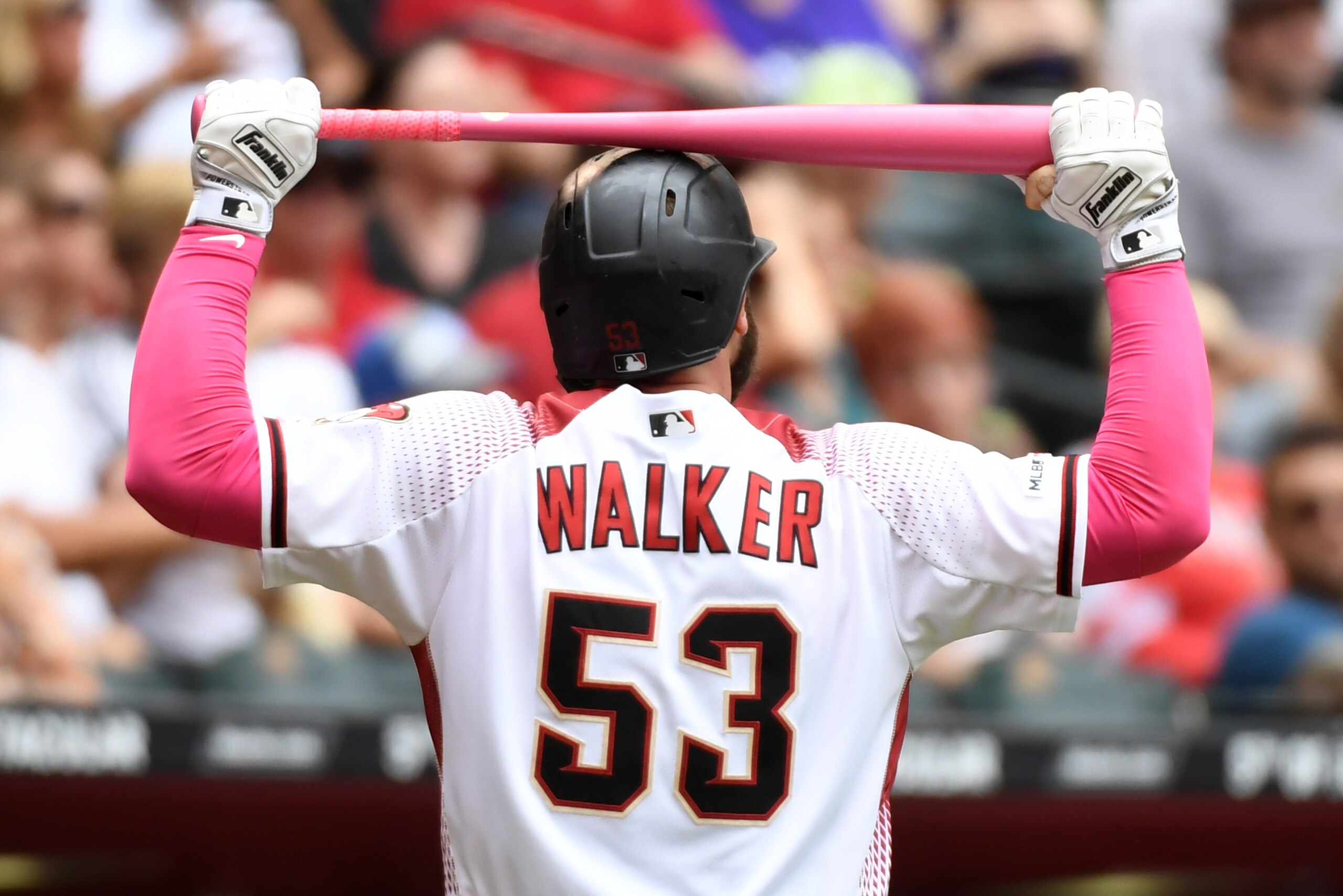 PHOENIX, ARIZONA - MAY 12: Christian Walker #53 of the Arizona Diamondbacks walks back to the dugout after striking out during the seventh inning against the Atlanta Braves at Chase Field on May 12, 2019 in Phoenix, Arizona. Braves won 5-3.(Photo by Norm 