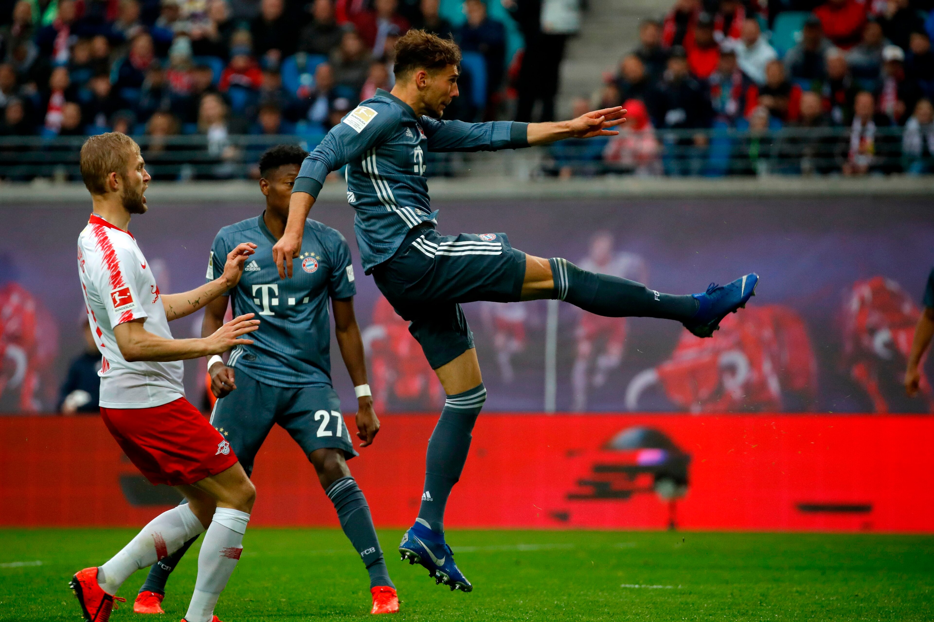 Bayern Munich's German midfielder Leon Goretzka kicks the ball to score a goal that was disallowed afterwards during the German first division Bundesliga football match RB Leipzig vs FC Bayern Munich in Leipzig, eastern Germany on May 11, 2019. (Photo by 