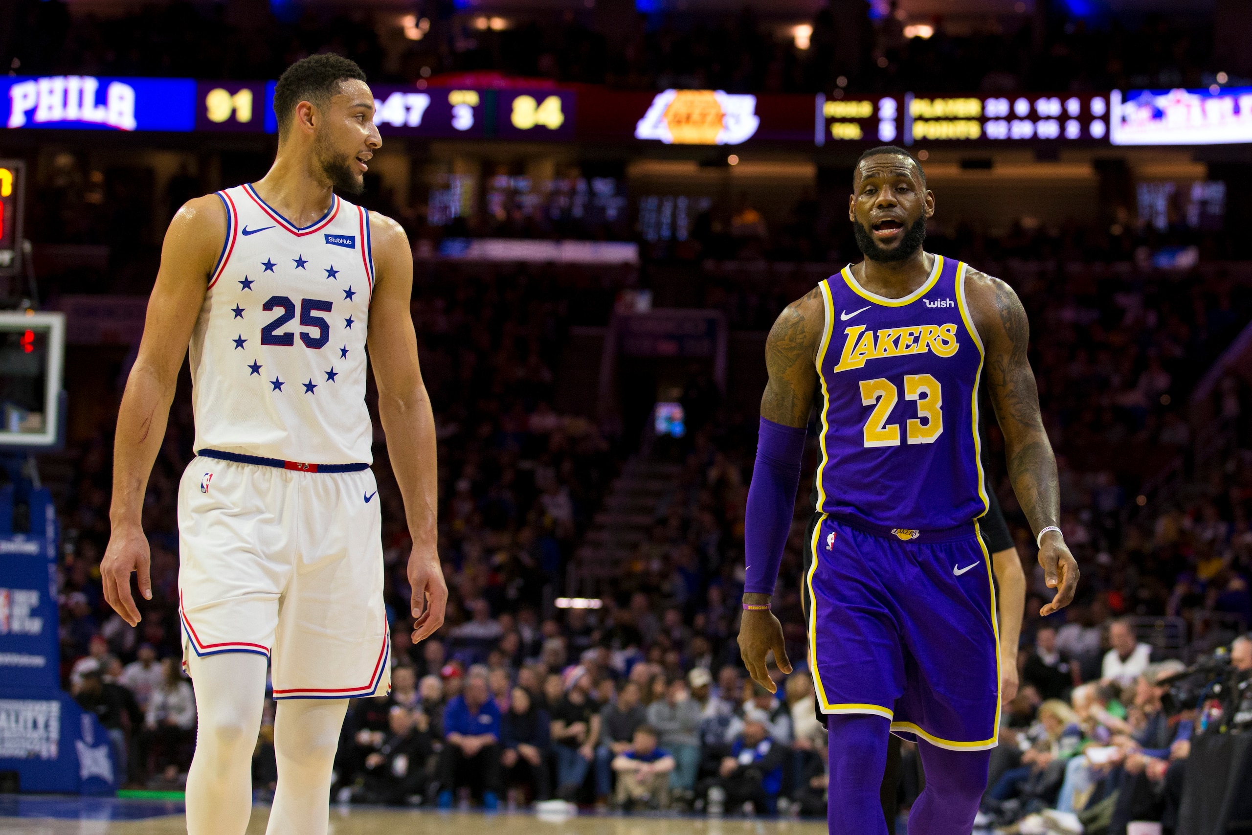 PHILADELPHIA, PA - FEBRUARY 10: Ben Simmons #25 of the Philadelphia 76ers talks to LeBron James #23 of the Los Angeles Lakers at the Wells Fargo Center on February 10, 2019 in Philadelphia, Pennsylvania. The 76ers defeated the Lakers 143-120. NOTE TO USER