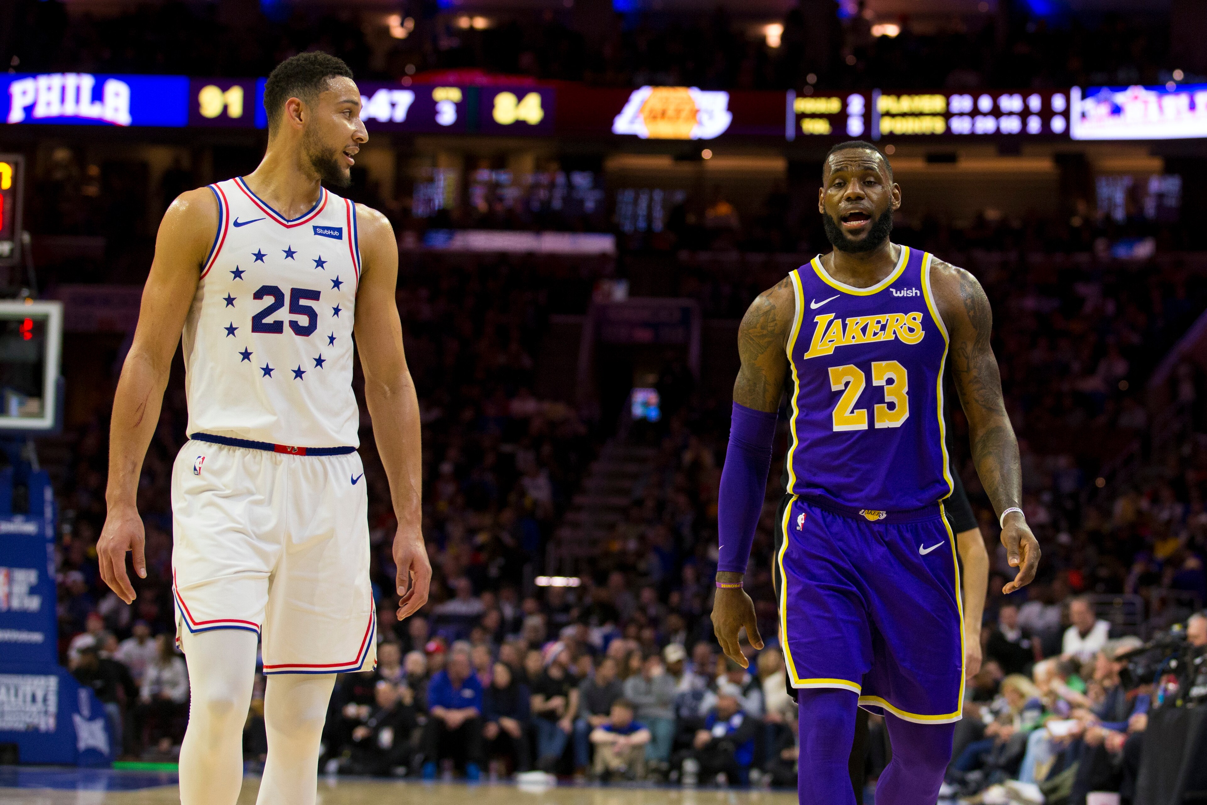 PHILADELPHIA, PA - FEBRUARY 10: Ben Simmons #25 of the Philadelphia 76ers talks to LeBron James #23 of the Los Angeles Lakers at the Wells Fargo Center on February 10, 2019 in Philadelphia, Pennsylvania. The 76ers defeated the Lakers 143-120. NOTE TO USER