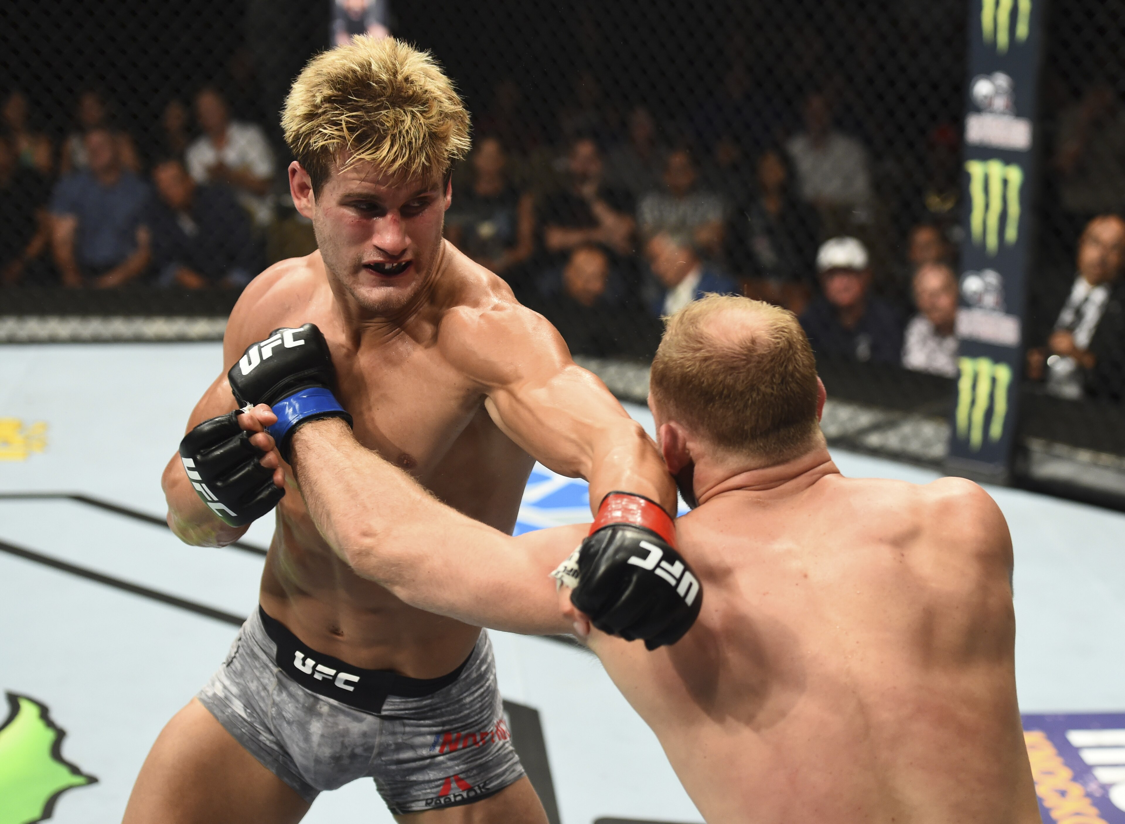 BOISE, ID - JULY 14:  (L-R) Sage Northcutt punches Zak Ottow in their welterweight fight during the UFC Fight Night event inside CenturyLink Arena on July 14, 2018 in Boise, Idaho. (Photo by Josh Hedges/Zuffa LLC/Zuffa LLC via Getty Images)