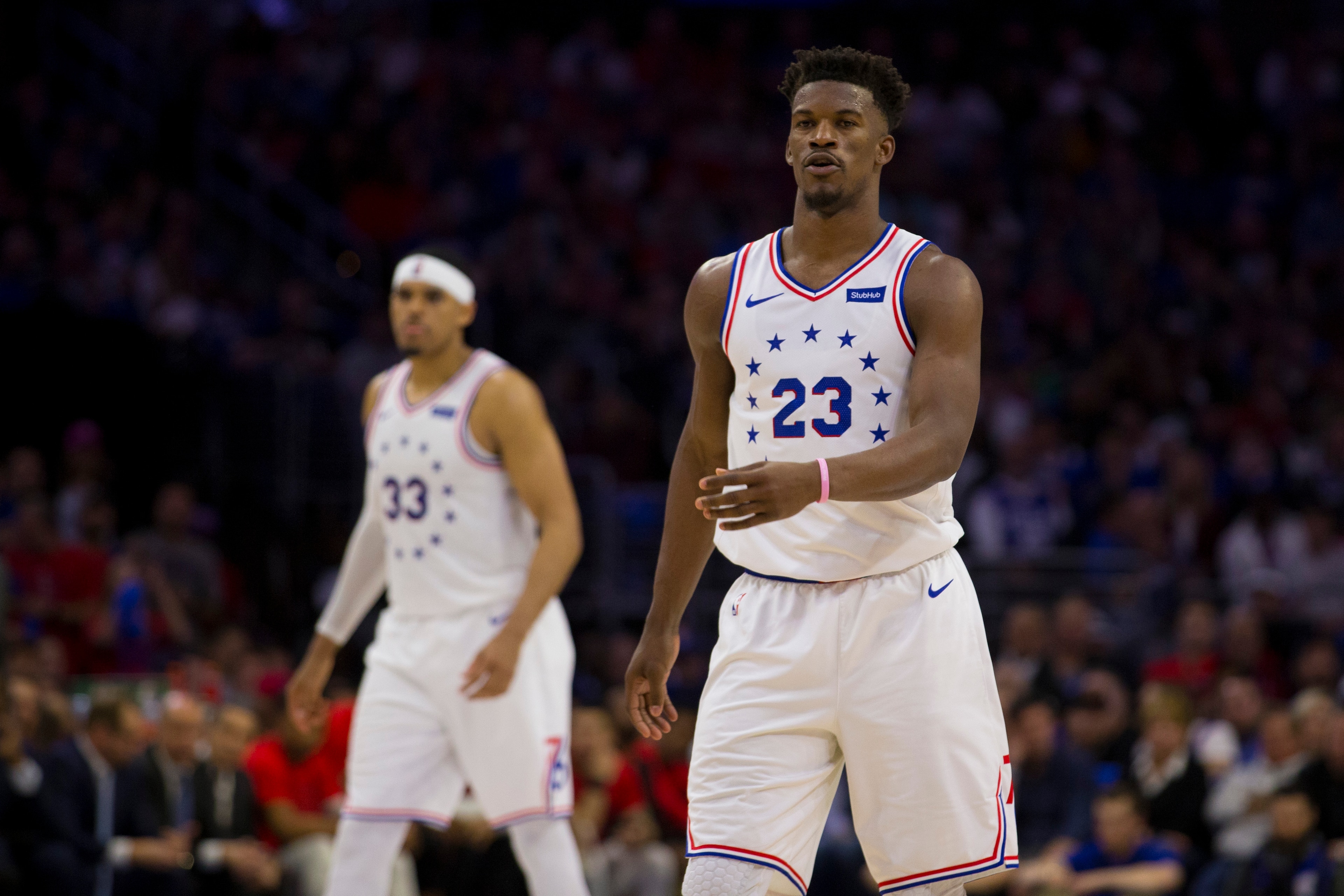 PHILADELPHIA, PA - MAY 05: Jimmy Butler #23 and Tobias Harris #33 of the Philadelphia 76ers look on against the Toronto Raptors in Game Four of the Eastern Conference Semifinals at the Wells Fargo Center on May 5, 2019 in Philadelphia, Pennsylvania. The R