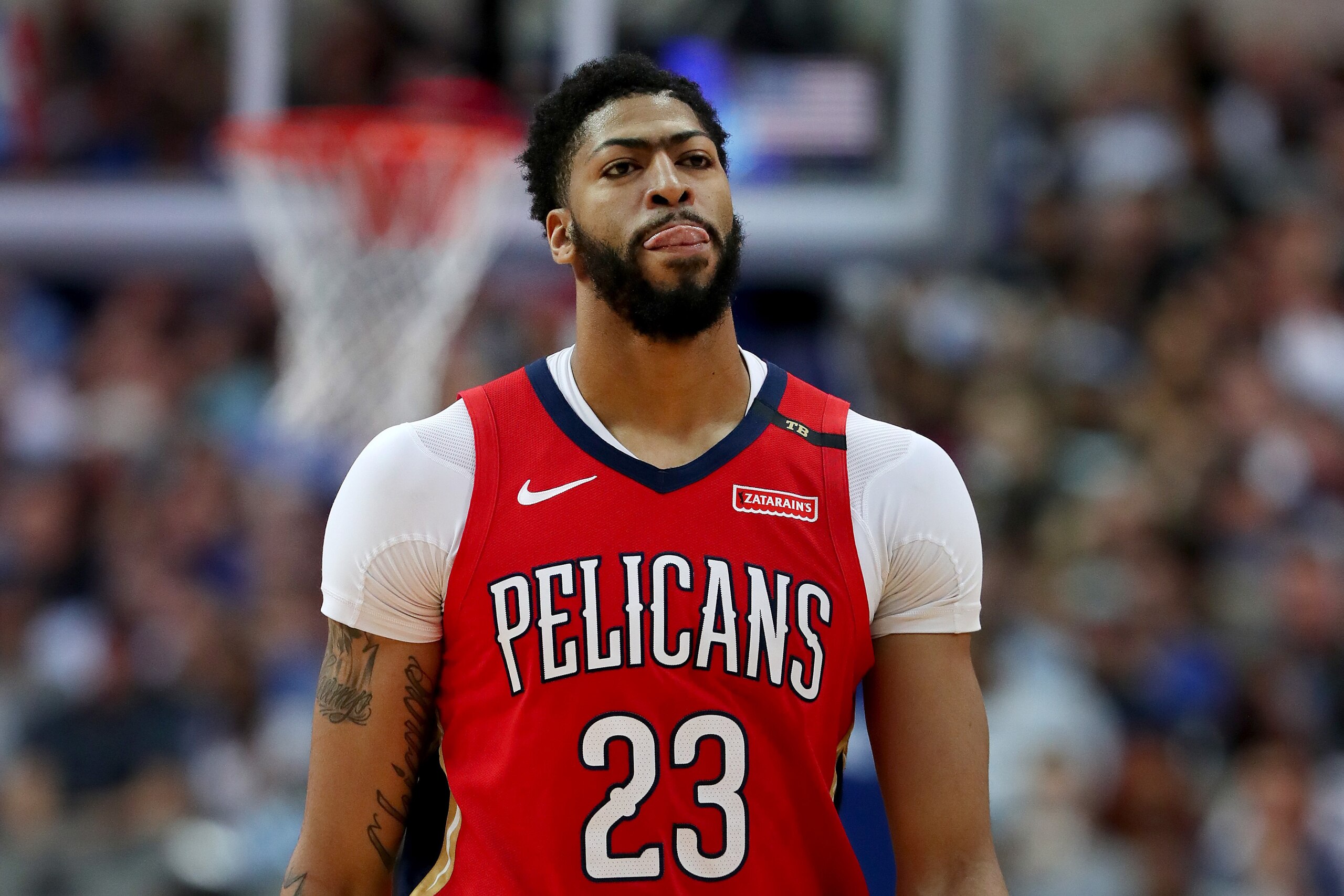 DALLAS, TEXAS - MARCH 18: Anthony Davis #23 of the New Orleans Pelicans walks off the court against the Dallas Mavericks in the first half at American Airlines Center on March 18, 2019 in Dallas, Texas. NOTE TO USER: User expressly acknowledges and agrees