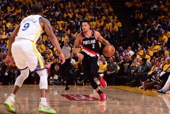 OAKLAND, CA - MAY 14: CJ McCollum #3 of the Portland Trail Blazers handles the ball against the Golden State Warriors  during Game One of the 2019 Western Conference Finals of the NBA Playoffs at the ORACLE Arena on May 14, 2019 in Oakland, California. NO