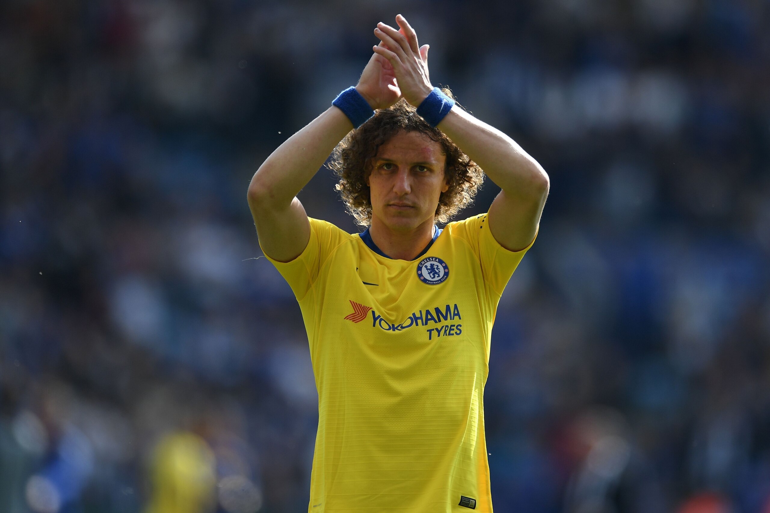 Chelsea's Brazilian defender David Luiz gestures to supporters on the pitch after the English Premier League football match between Leicester City and Chelsea at King Power Stadium in Leicester, central England on May 12, 2019. - The game finished 0-0. (P