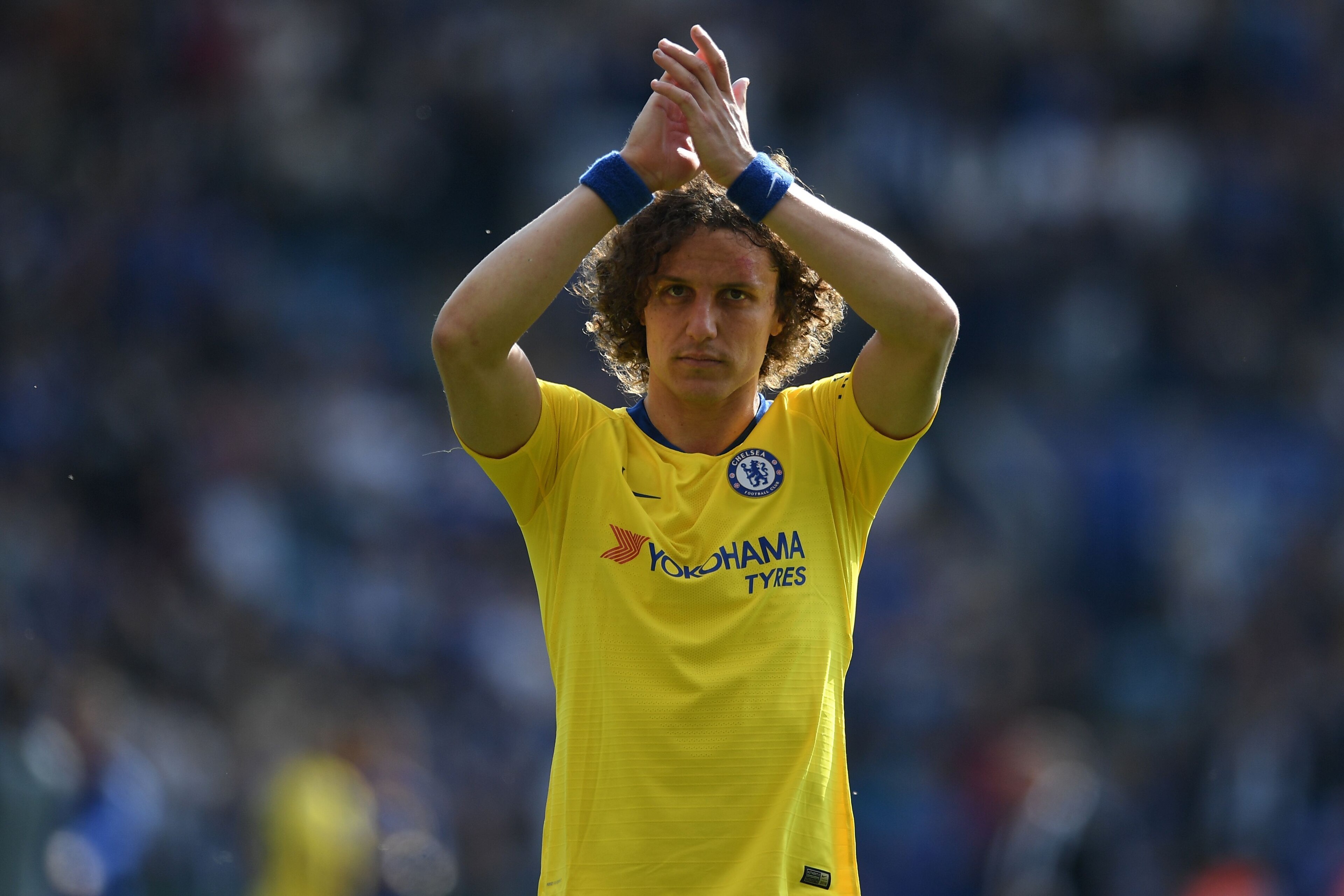 Chelsea's Brazilian defender David Luiz gestures to supporters on the pitch after the English Premier League football match between Leicester City and Chelsea at King Power Stadium in Leicester, central England on May 12, 2019. - The game finished 0-0. (P