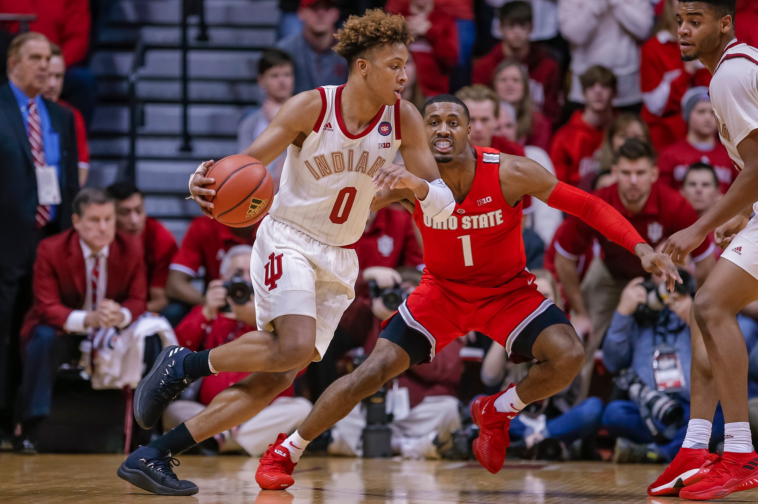 BLOOMINGTON, IN - FEBRUARY 10: Romeo Langford #0 of the Indiana Hoosiers dribbles the ball against Luther Muhammad #1 of the Ohio State Buckeyes at Assembly Hall on February 10, 2019 in Bloomington, Indiana. (Photo by Michael Hickey/Getty Images)