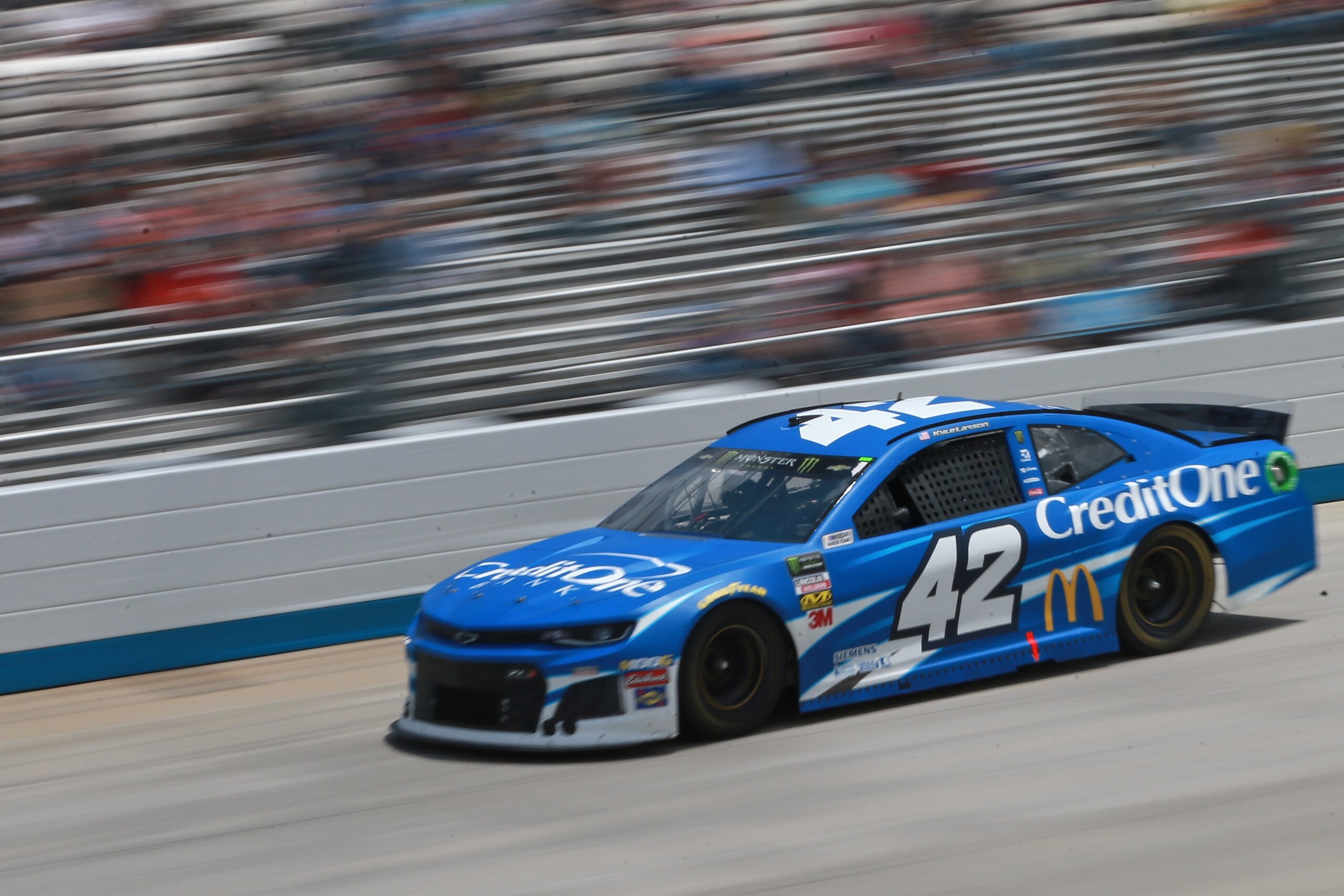 DOVER, DE - MAY 06: Kyle Larson, driver of the #42 Credit One Bank Chevrolet, races during the Monster Energy NASCAR Cup Series Gander RV 400 at Dover International Speedway on May 6, 2019 in Dover, Delaware. (Photo by Matt Sullivan/Getty Images) DOVER, DE - MAY 06: Kyle Larson, driver of the #42 Credit One Bank Chevrolet, races during the Monster Energy NASCAR Cup Series Gander RV 400 at Dover International Speedway on May 6, 2019 in Dover, Delaware. (Photo by Matt Sullivan/Getty Images)