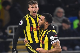 CARDIFF, WALES - FEBRUARY 22:  Gerard Deulofeu of Watford celebrates with Troy Deeney as he scores his team's second goal during the Premier League match between Cardiff City and Watford FC at Cardiff City Stadium on February 22, 2019 in Cardiff, United K