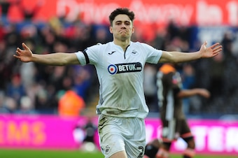SWANSEA, WALES - FEBRUARY 17: Daniel James of Swansea City celebrates scoring his side's second goal during the FA Cup Fifth Round match between Swansea City and Brentford at the Liberty Stadium on February 17, 2019 in Swansea, Wales. (Photo by Athena Pic