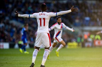 CARDIFF, WALES - MAY 04: Andros Townsend of Crystal Palace celebrate with Wilfried Zaha after scoring goal during the Premier League match between Cardiff City and Crystal Palace at Cardiff City Stadium on May 4, 2019 in Cardiff, United Kingdom. (Photo by