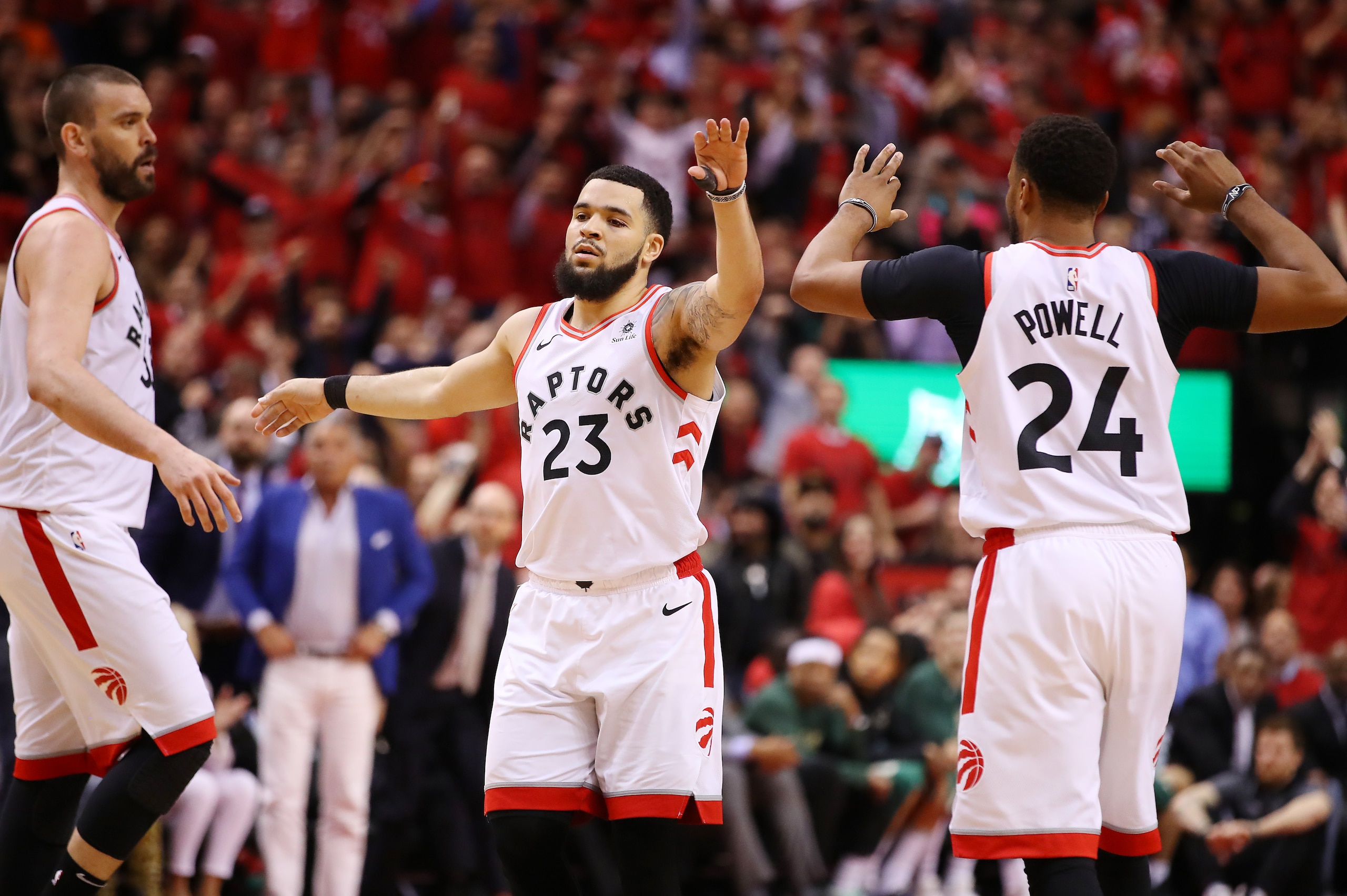 TORONTO, ONTARIO - MAY 21: Fred VanVleet #23 of the Toronto Raptors high fives teammates during the second half against the Milwaukee Bucks in game four of the NBA Eastern Conference Finals at Scotiabank Arena on May 21, 2019 in Toronto, Canada. NOTE TO U